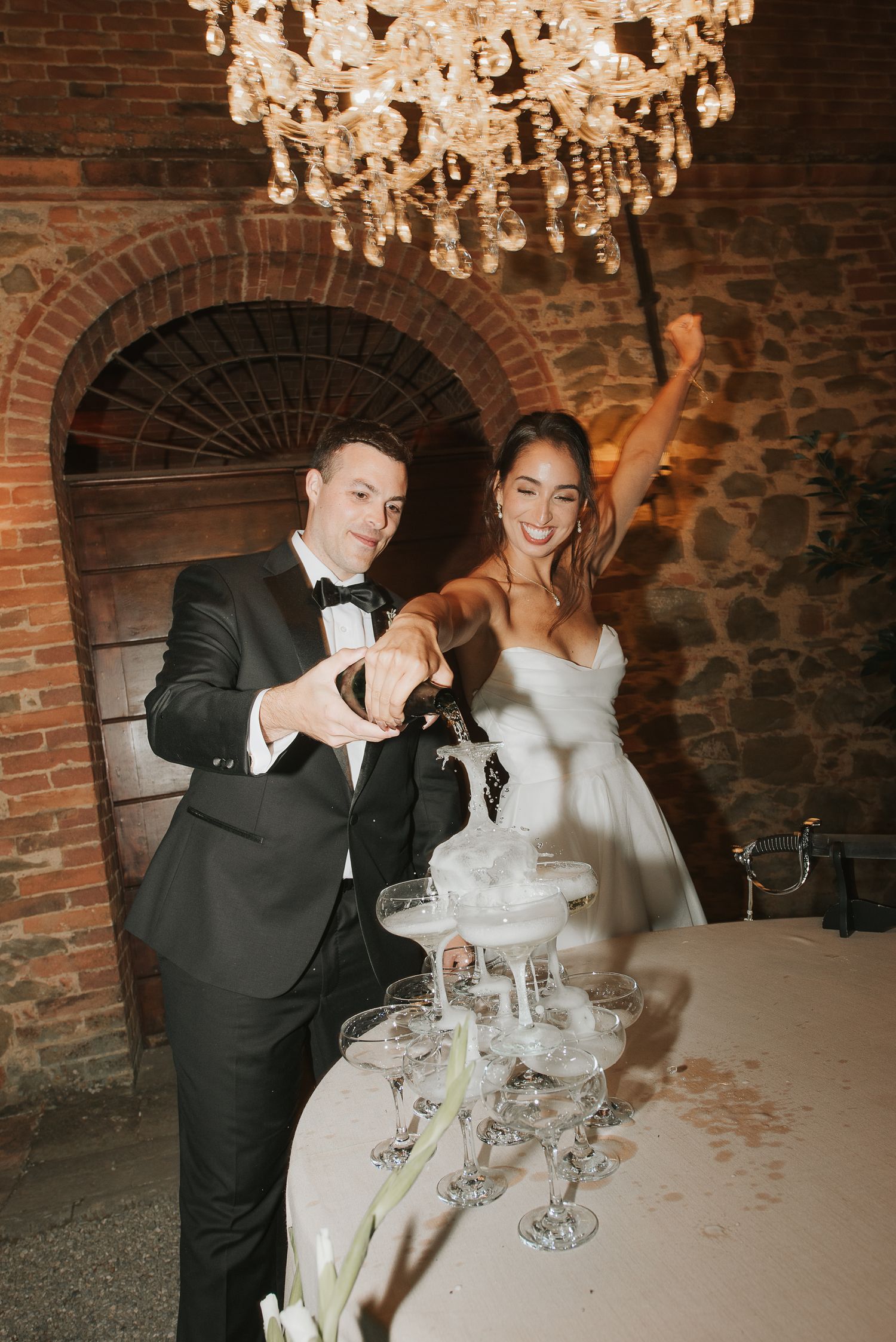 Wedding champagne tower during elegant Tuscany wedding reception