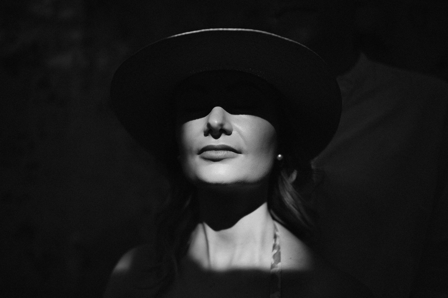 Black and white pre-wedding portrait captured in Positano, Italy, with a cinematic and editorial approach