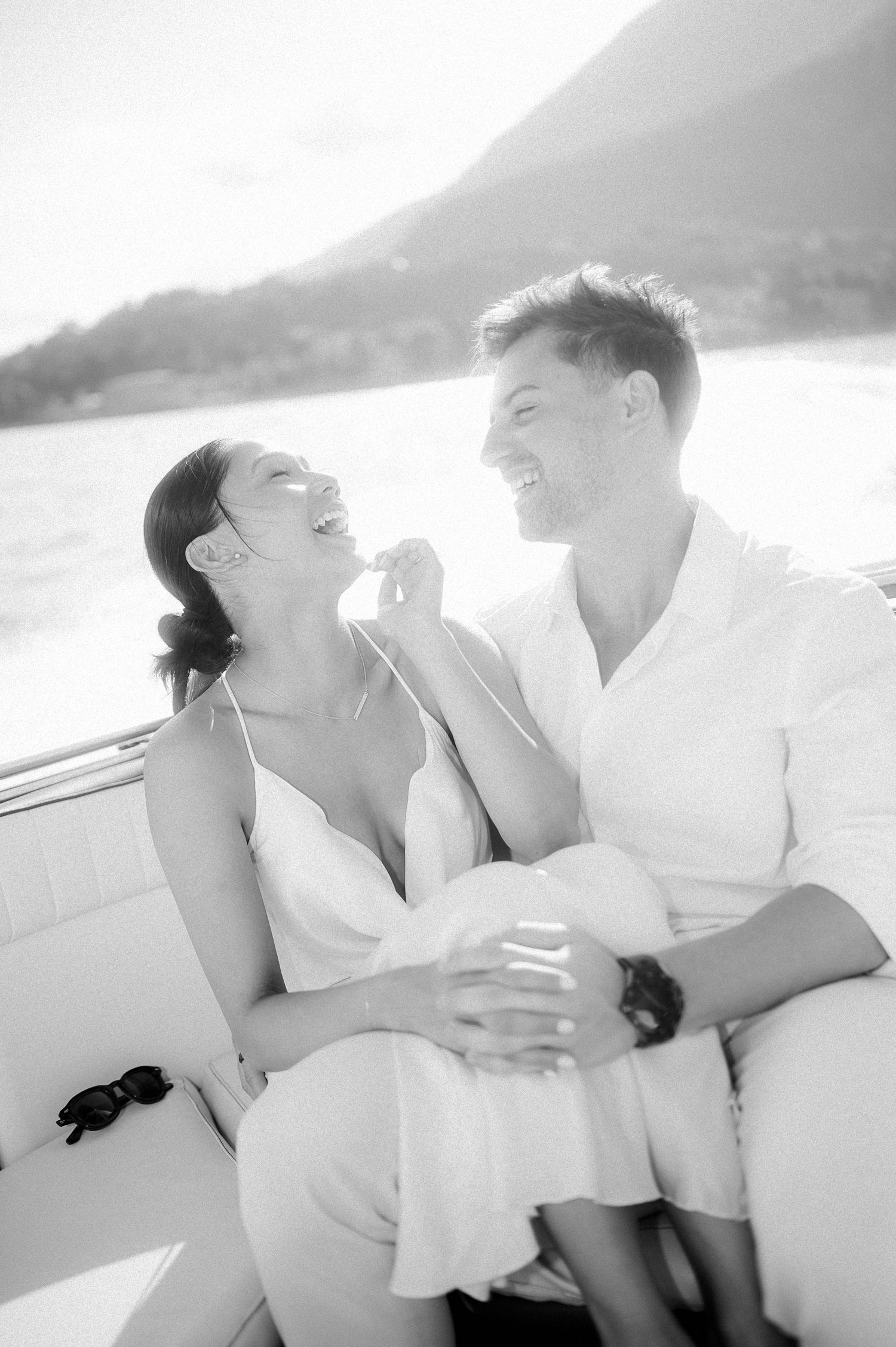 Intimate black and white portrait of a couple during a Lake Como destination wedding boat session