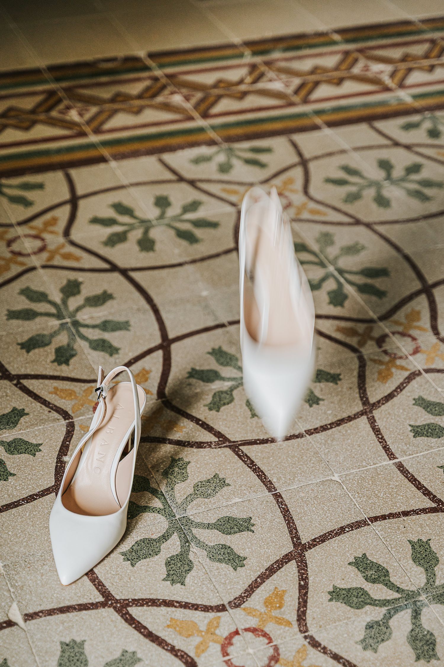 Elegant bridal shoes photographed as a refined wedding detail during a luxury destination wedding in Italy