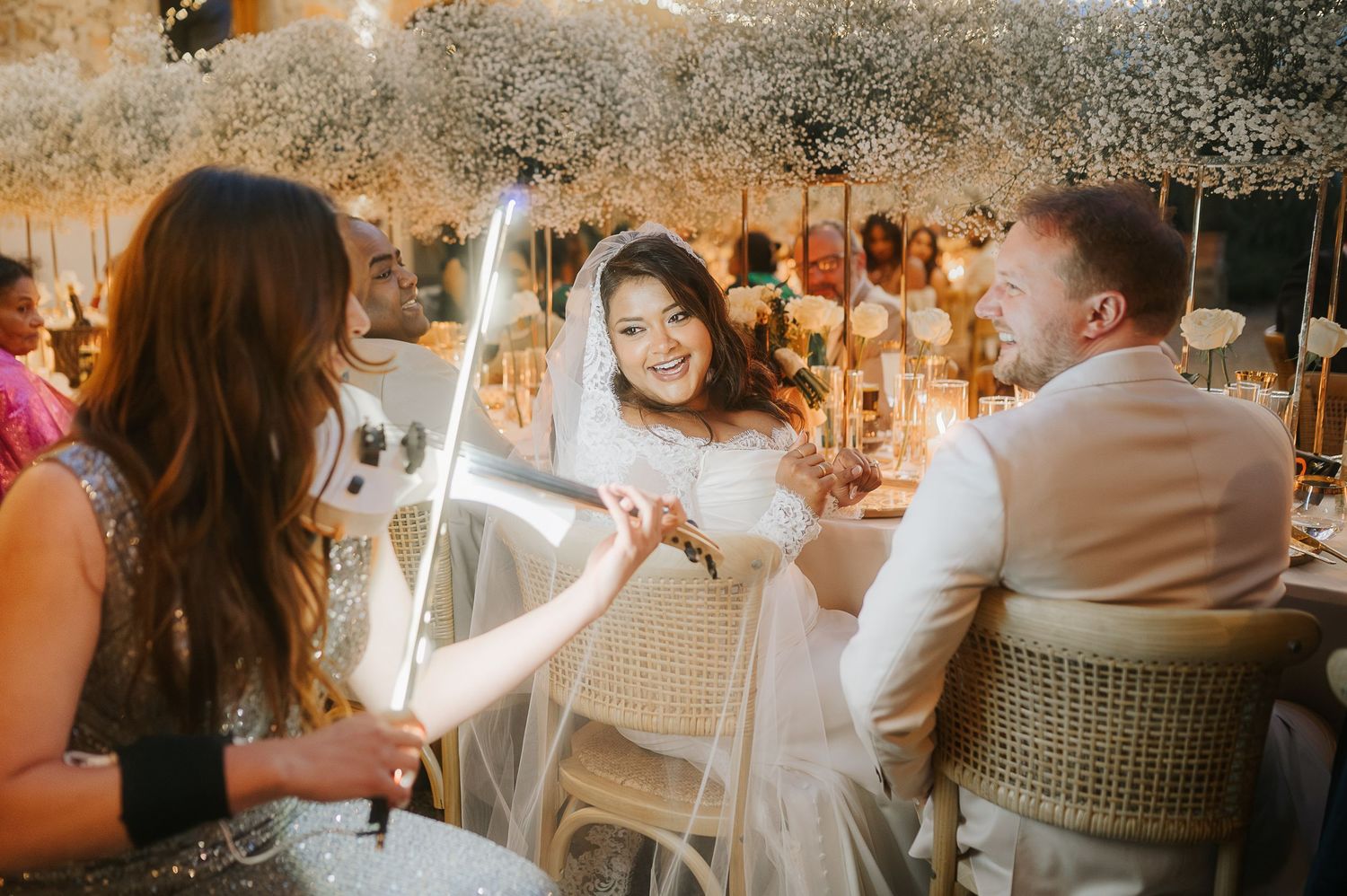 Intimate wedding dinner captured during a refined destination celebration, highlighting atmosphere and connection