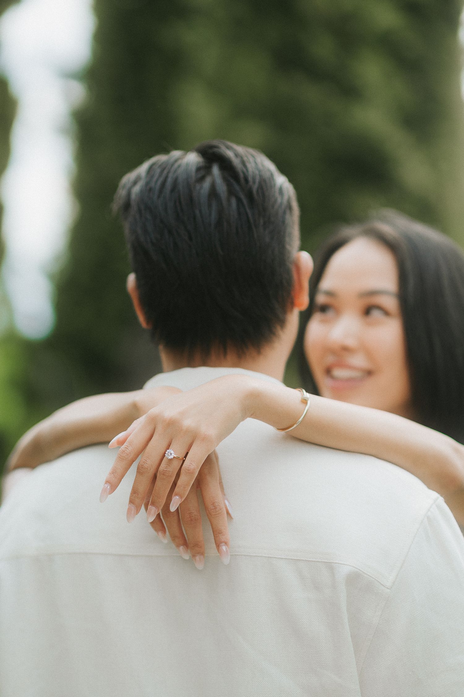 Couple embracing during Lake Como engagement session