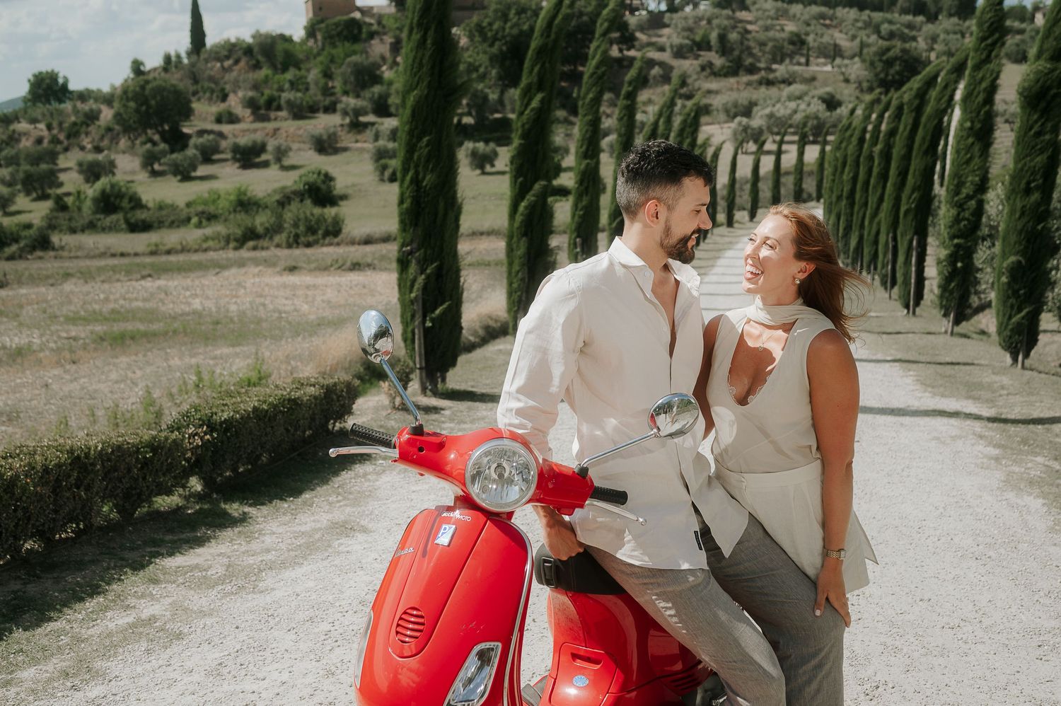 Engagement photoshoot with Vespa in Tuscany countryside