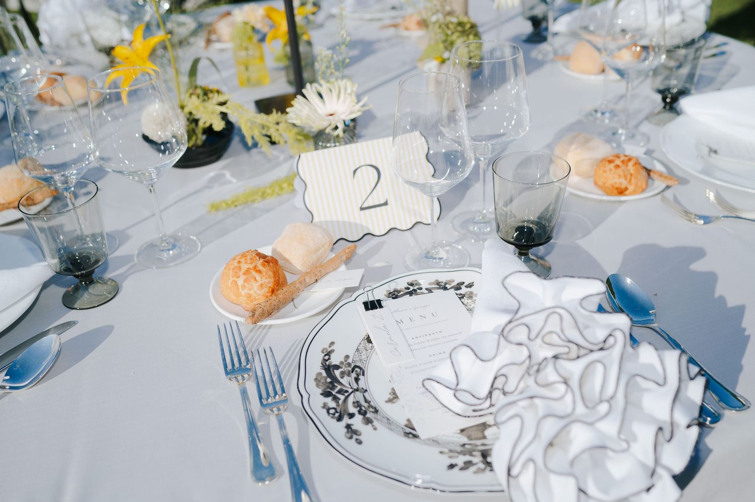 Refined wedding table setting detail photographed during a luxury wedding in Tuscany, Italy