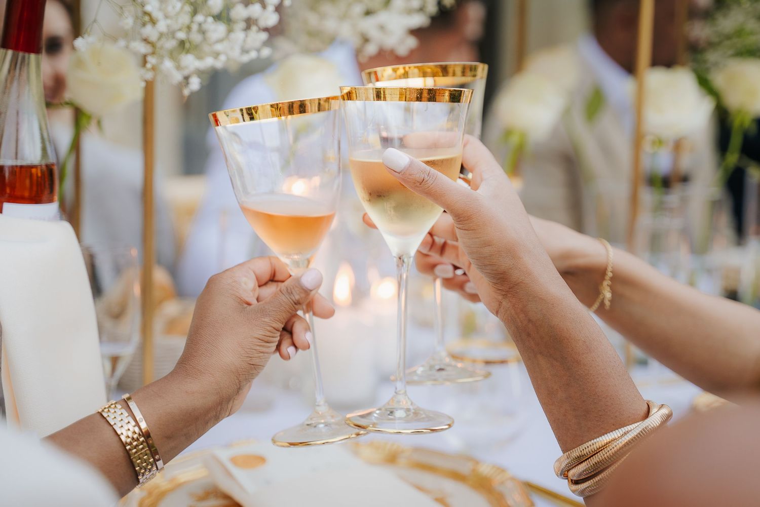 Wedding toast detail captured during a luxury celebration in Tuscany, Italy, highlighting refined atmosphere