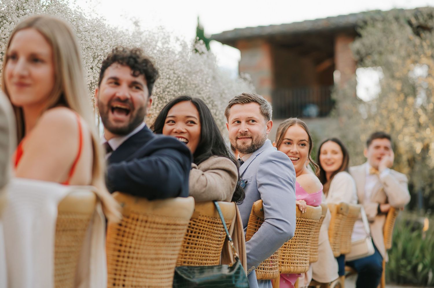 Joyful wedding guest moment captured during a relaxed and elegant destination wedding experience