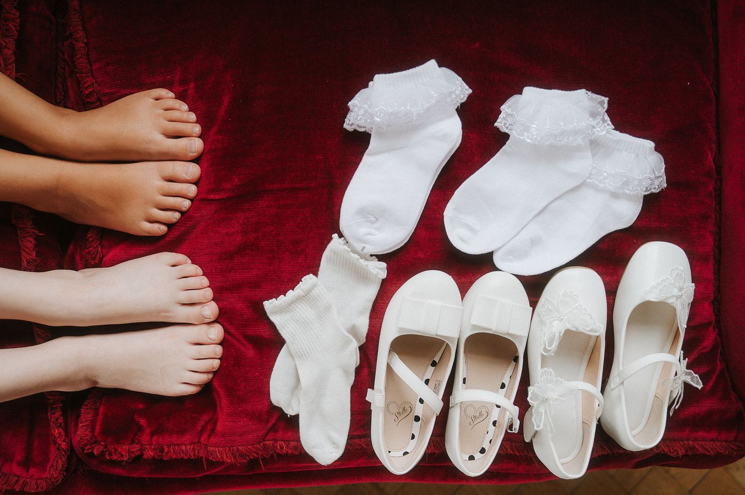 Wedding day details featuring shoes and personal touches captured in a refined and intimate editorial style