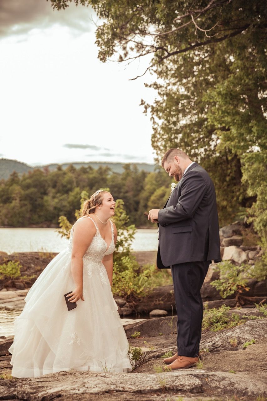 Couple exchanging private vows before their fall wedding at Camp Dudley in Westport, New York captured by illuminate the stars Photography