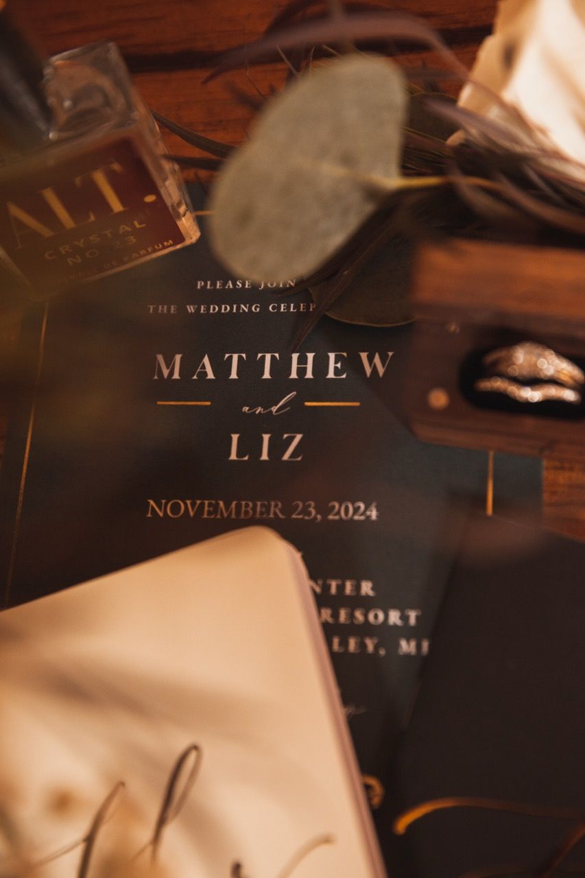 Flat lay for winter wedding at Sugarloaf Mountain Resort in Carrabassett Valley, Maine captured by illuminate the stars Photography