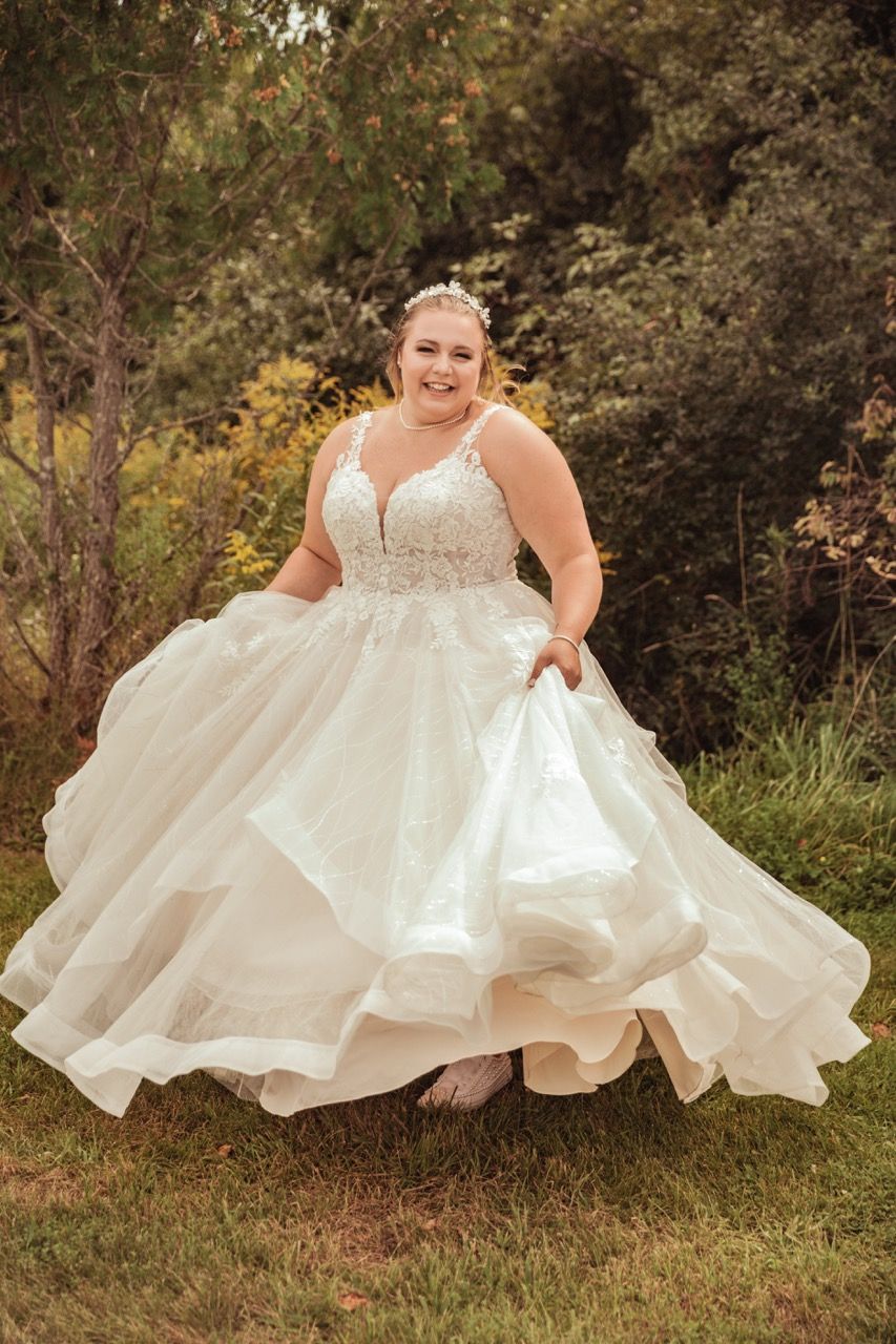Bride twirling dress before her fall wedding at Camp Dudley in Westport, New York captured by illuminate the stars Photography