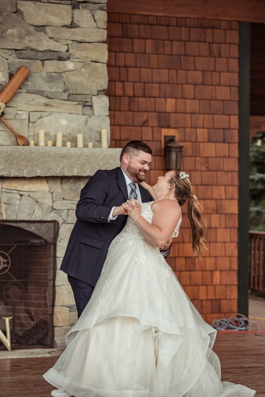 Couple's first dance during their fall wedding at Camp Dudley in Westport, New York captured by illuminate the stars Photography