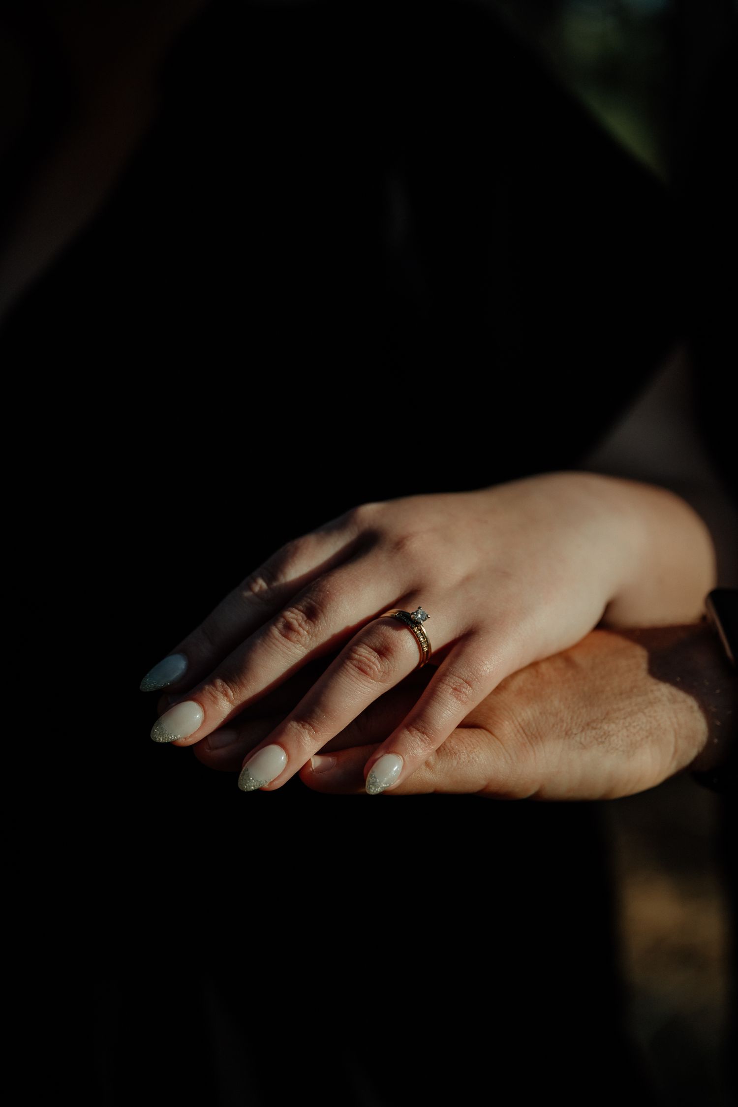 couple engagement portrait session contemporary hands Eden Forest Stellenbosch South Africa black and white Plain Blue Wedding Photo Film