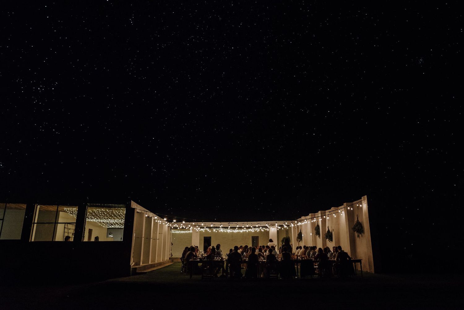 Guests dancing under the stars at Abrahamskraal Guest Farm