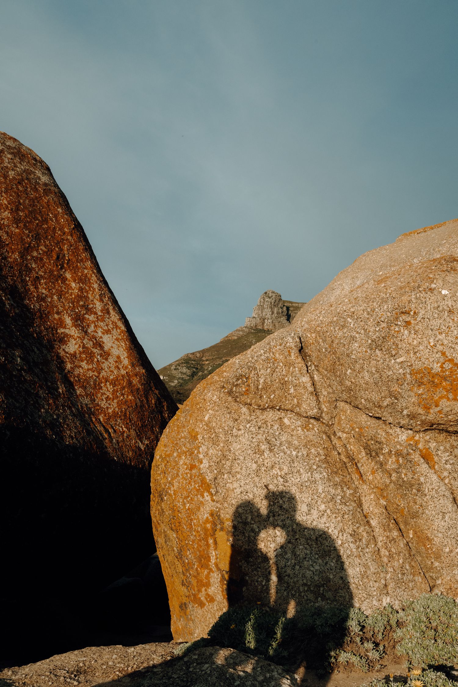 shadows boulders couple romantic warm light sunset Camp's Bay Cape Town South Africa Plain Blue Studio