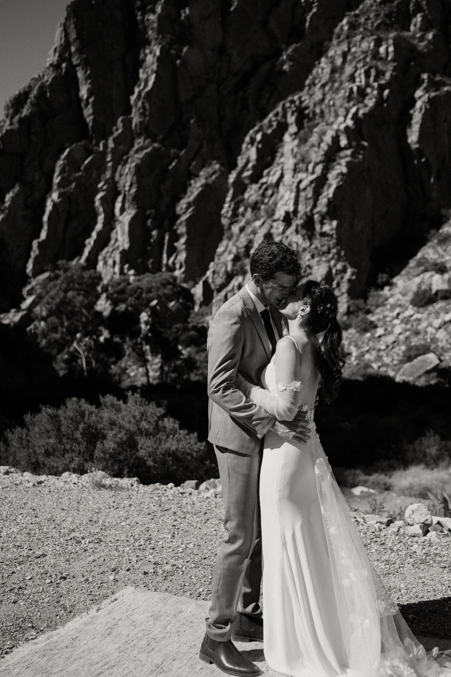 Newlyweds first kiss at Eerstewater ceremony in the Swartberg Pass for their Prince Albert destination wedding