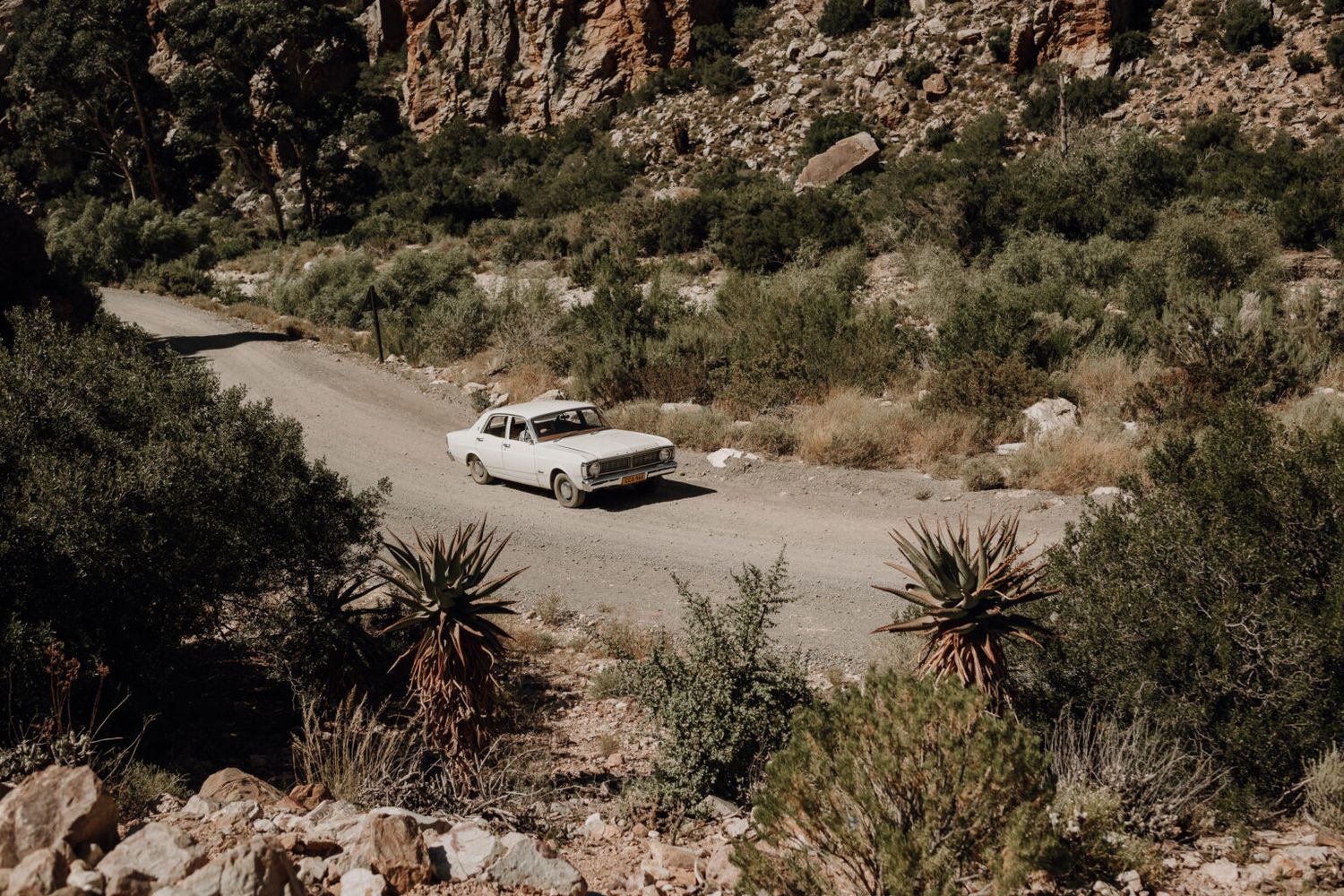 vintage wedding car dirt road Swartberg Mountain Prince Albert Eerstewater Dance Floor South Africa documentary Karoo Plain Blue Photo Film