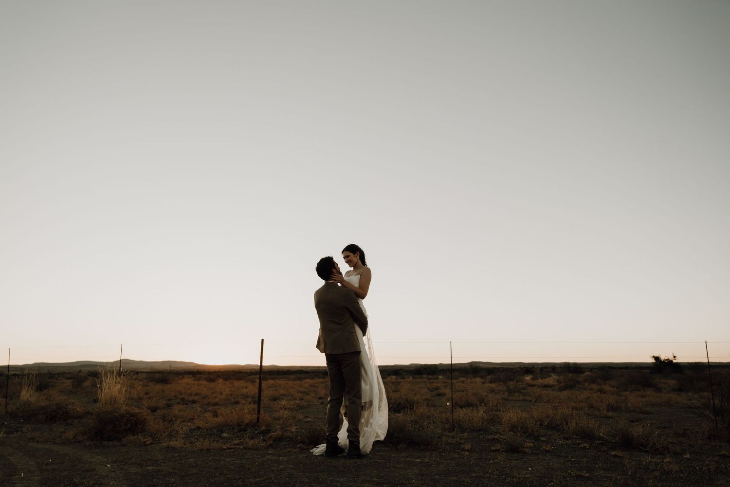 Sunset couple portrait at Abrahamskraal Guest Farm