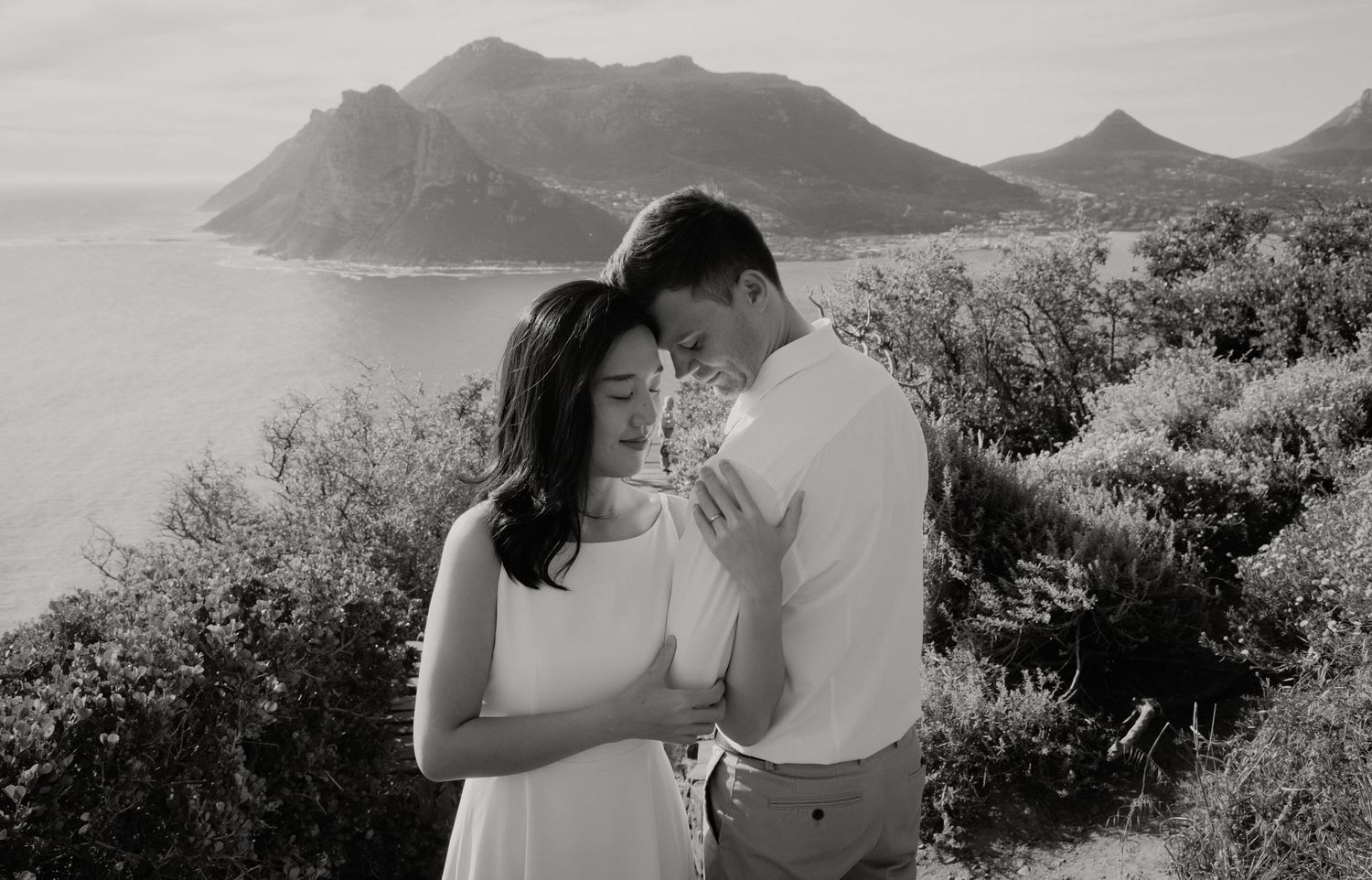 engagement couple intimate pose contemporary editorial Camp's Bay Cape Town South Africa Plain Blue Wedding Photo & Film black and white