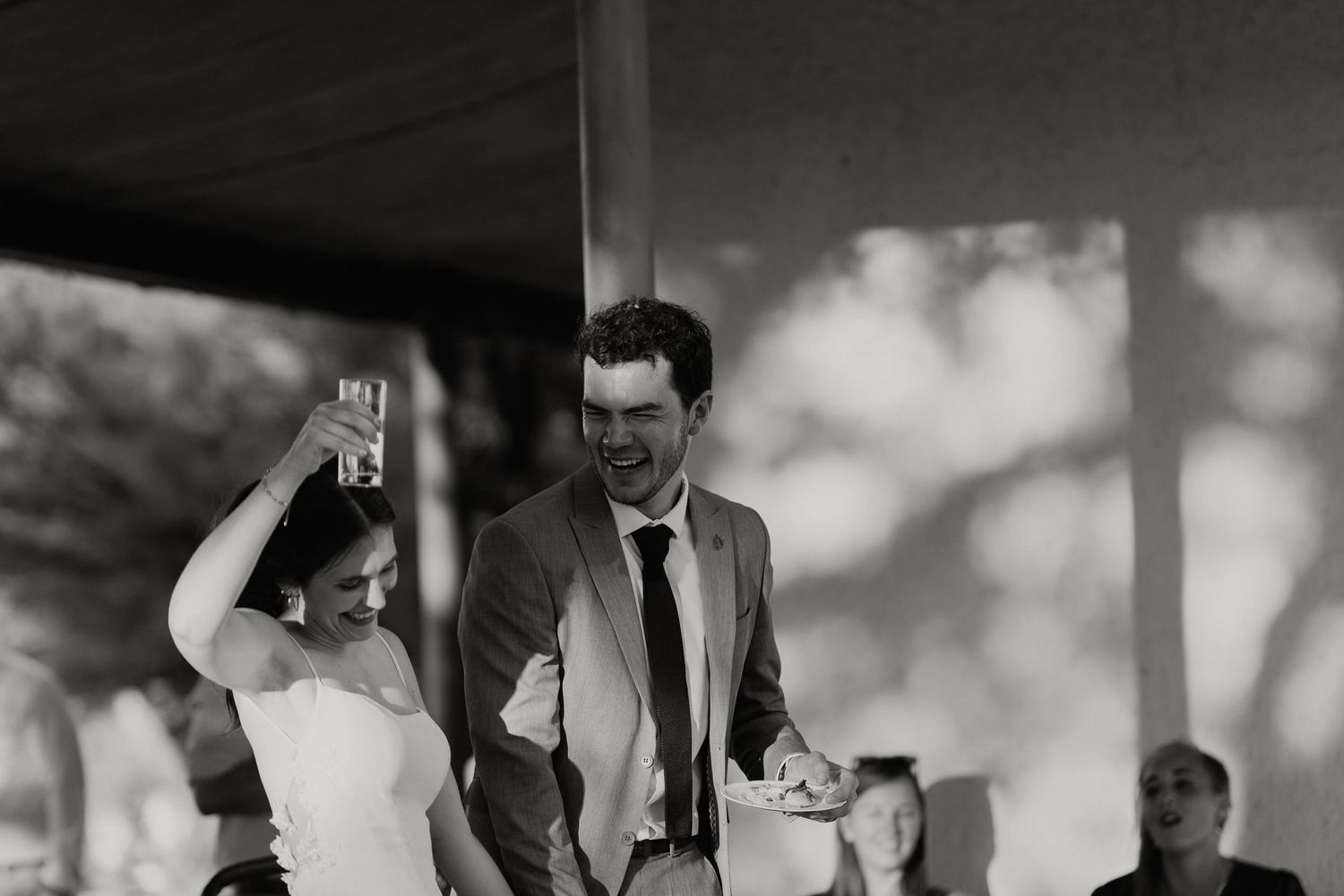 Wedding couple enjoying speeches during canapes Abrahamskraal Guest Farm Prince Albert