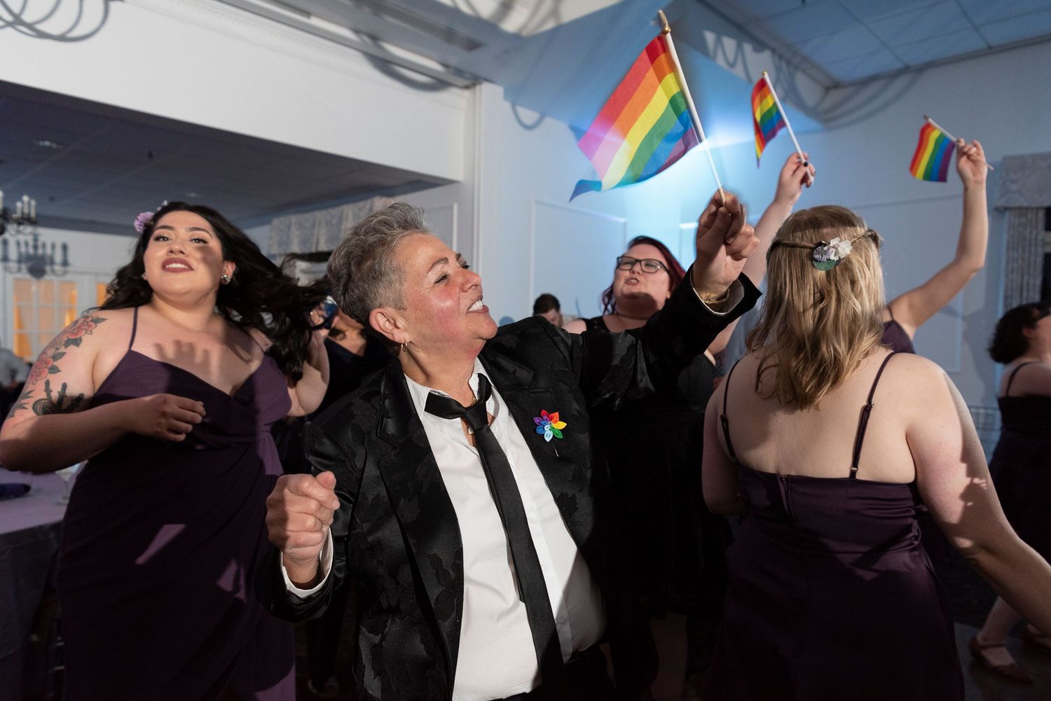 Candid LGBTQ+ wedding photo by a New England wedding photographer.