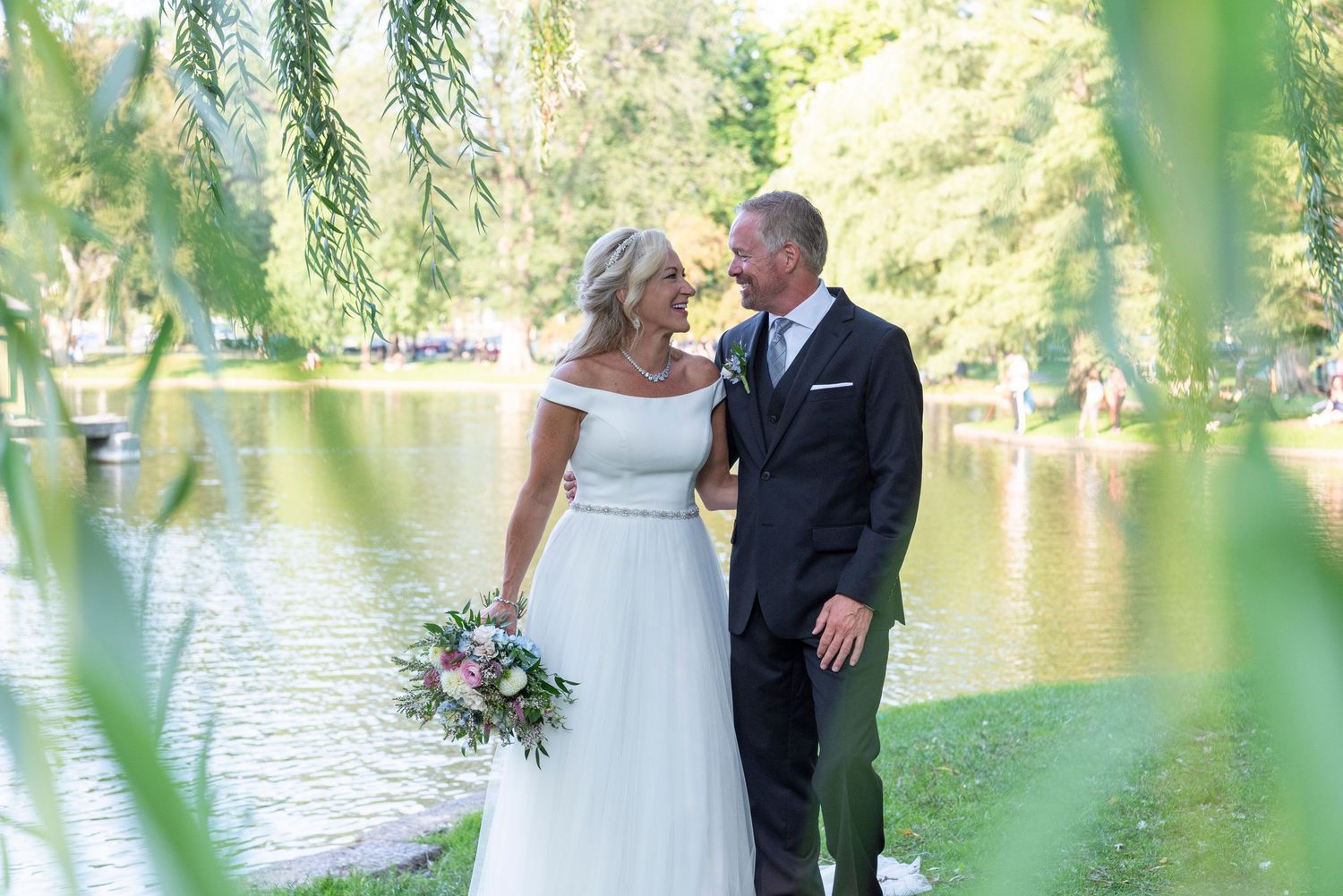 Elegant and romantic Boston garden wedding portraits captured in natural light.