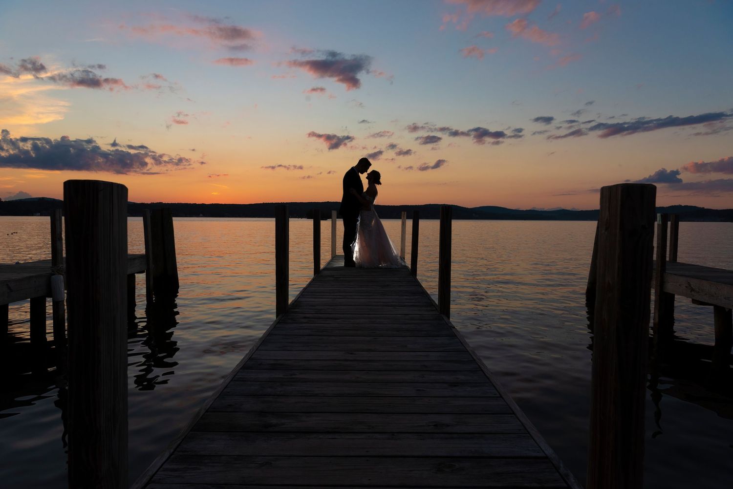 Timeless Lake Winnipesaukee wedding photos showcasing love, scenery, and celebration.