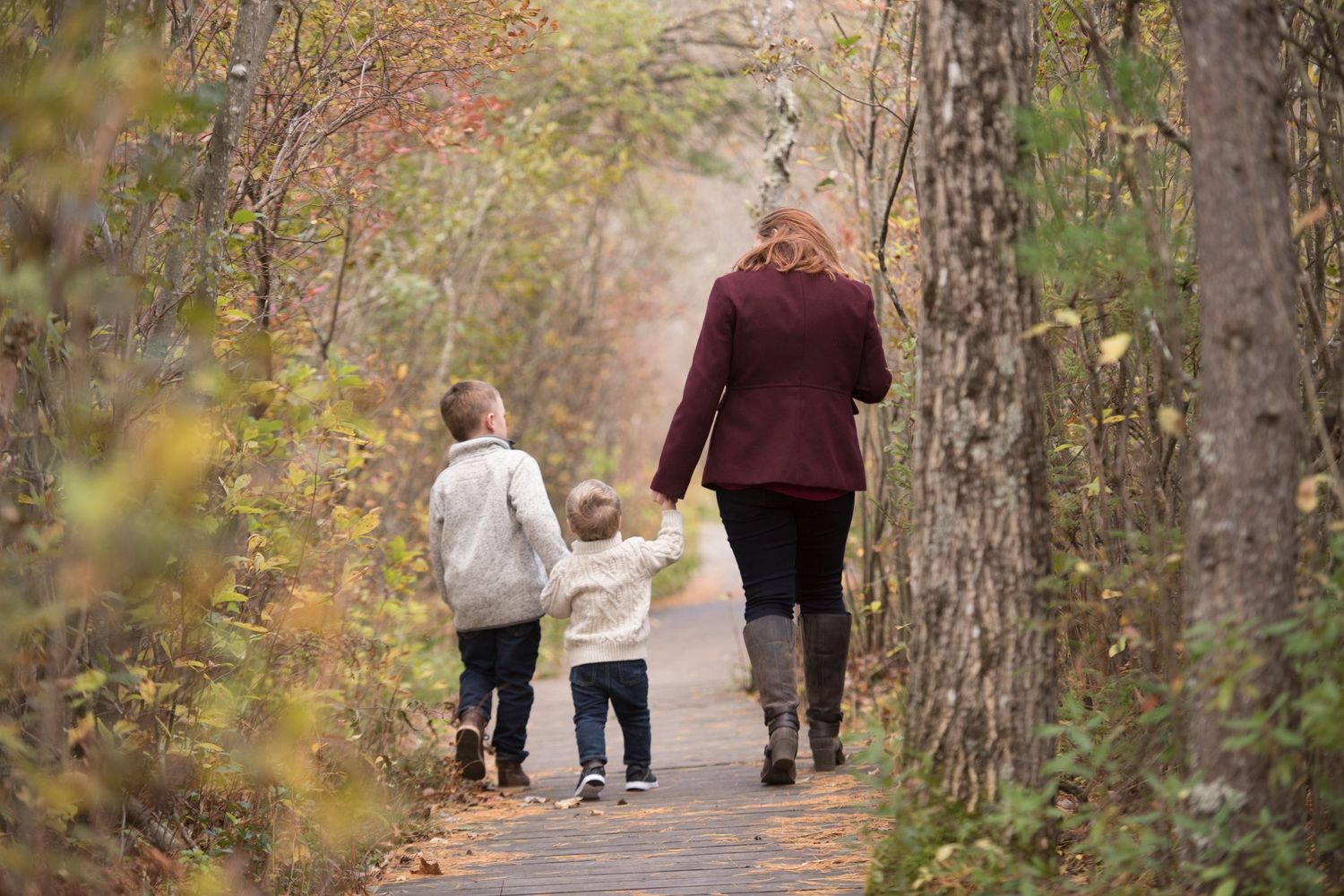 Lifestyle family photo session at home in New Hampshire capturing natural, relaxed moments.