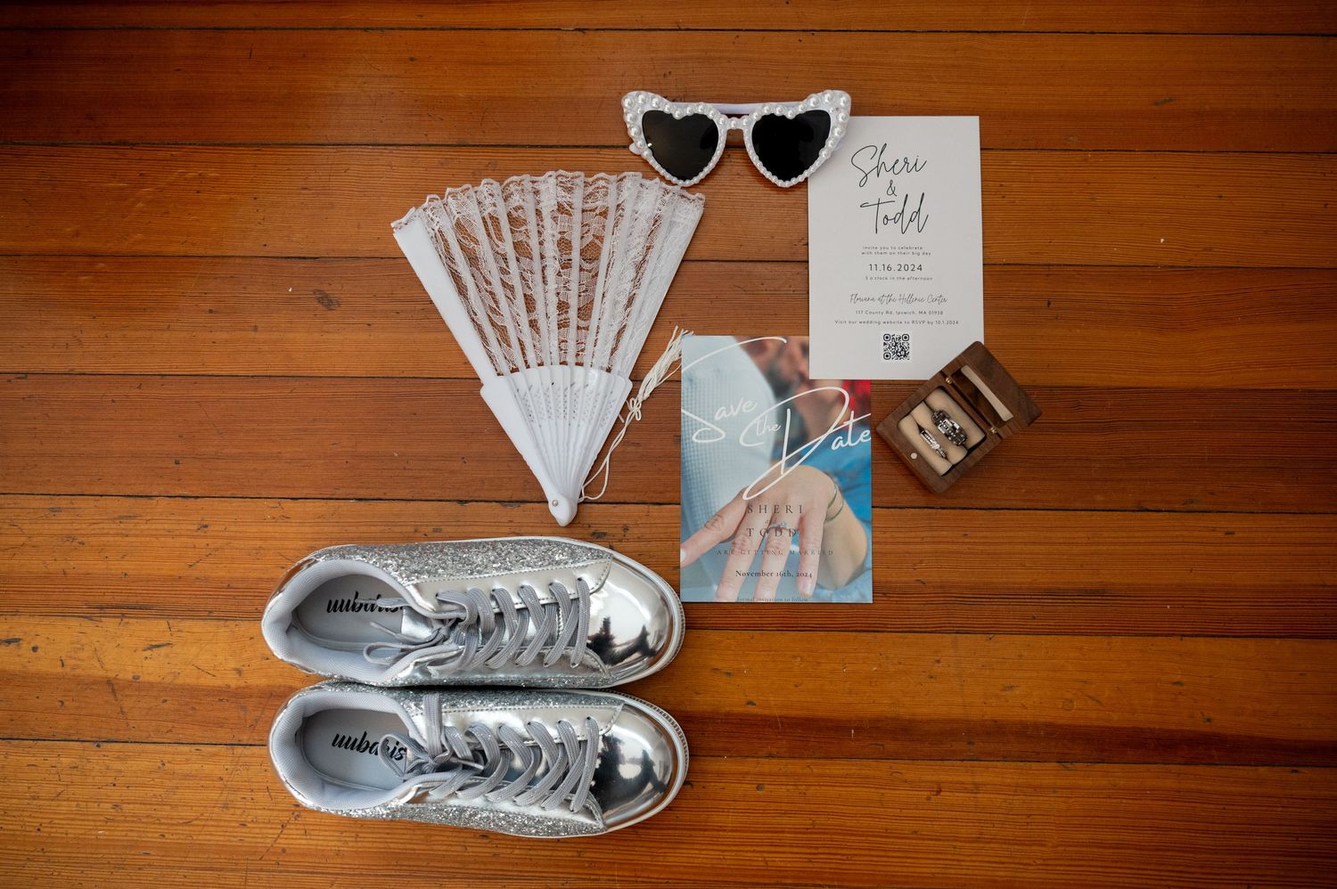 New Hampshire wedding photographer capturing wedding details including rings, flowers, and stationery.