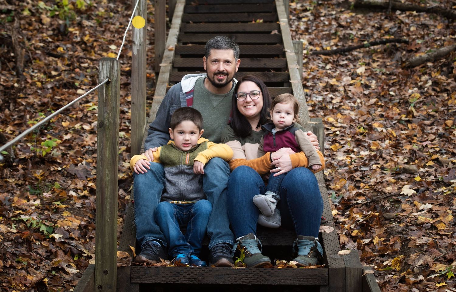 Lifestyle family photo session at home in New Hampshire capturing natural, relaxed moments.