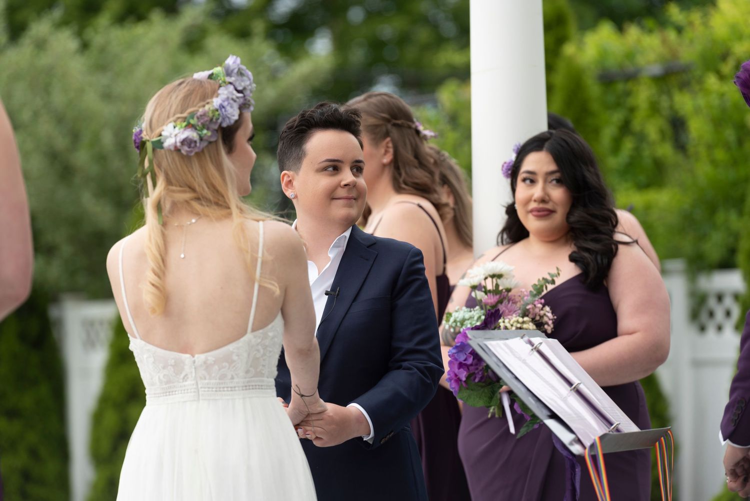 Inclusive wedding photography capturing emotional vows between two grooms.