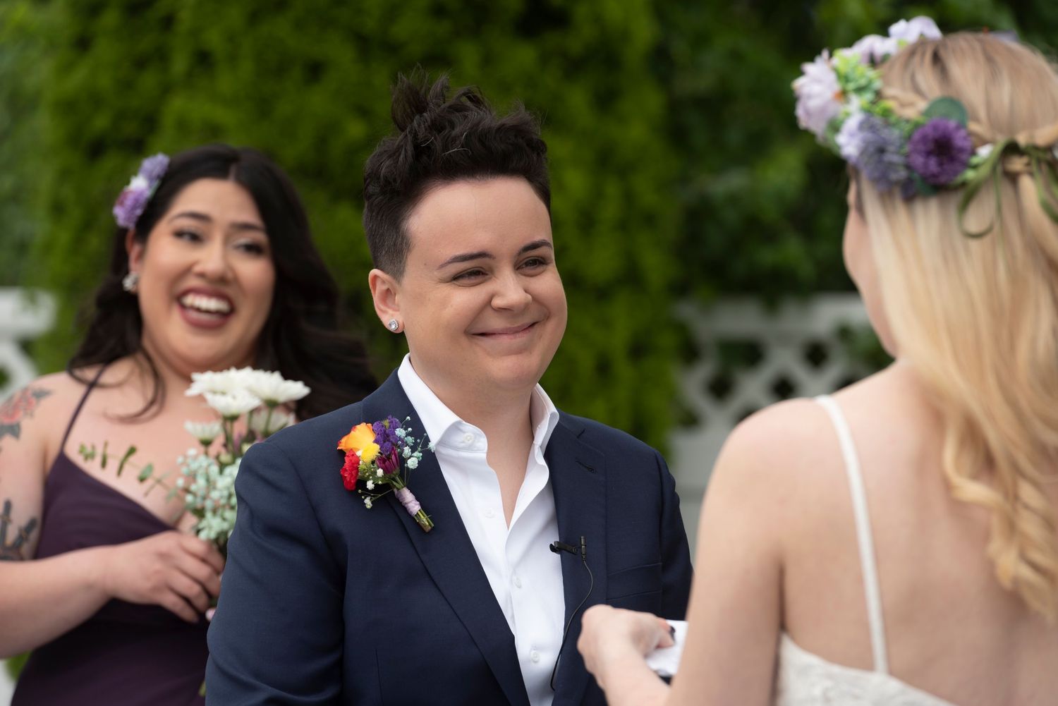 Inclusive wedding photography capturing emotional vows between two brides.