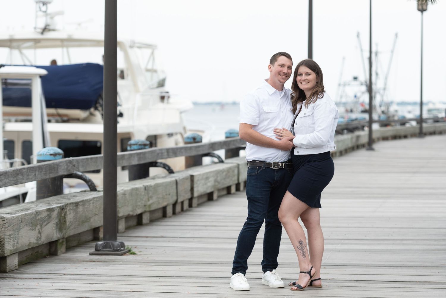 Romantic beach engagement session at sunrise with natural light and ocean views.