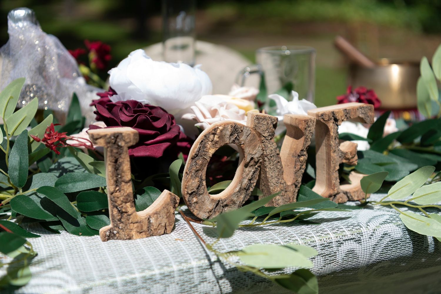 Timeless close-up wedding detail photos highlighting rings, florals, and decor.