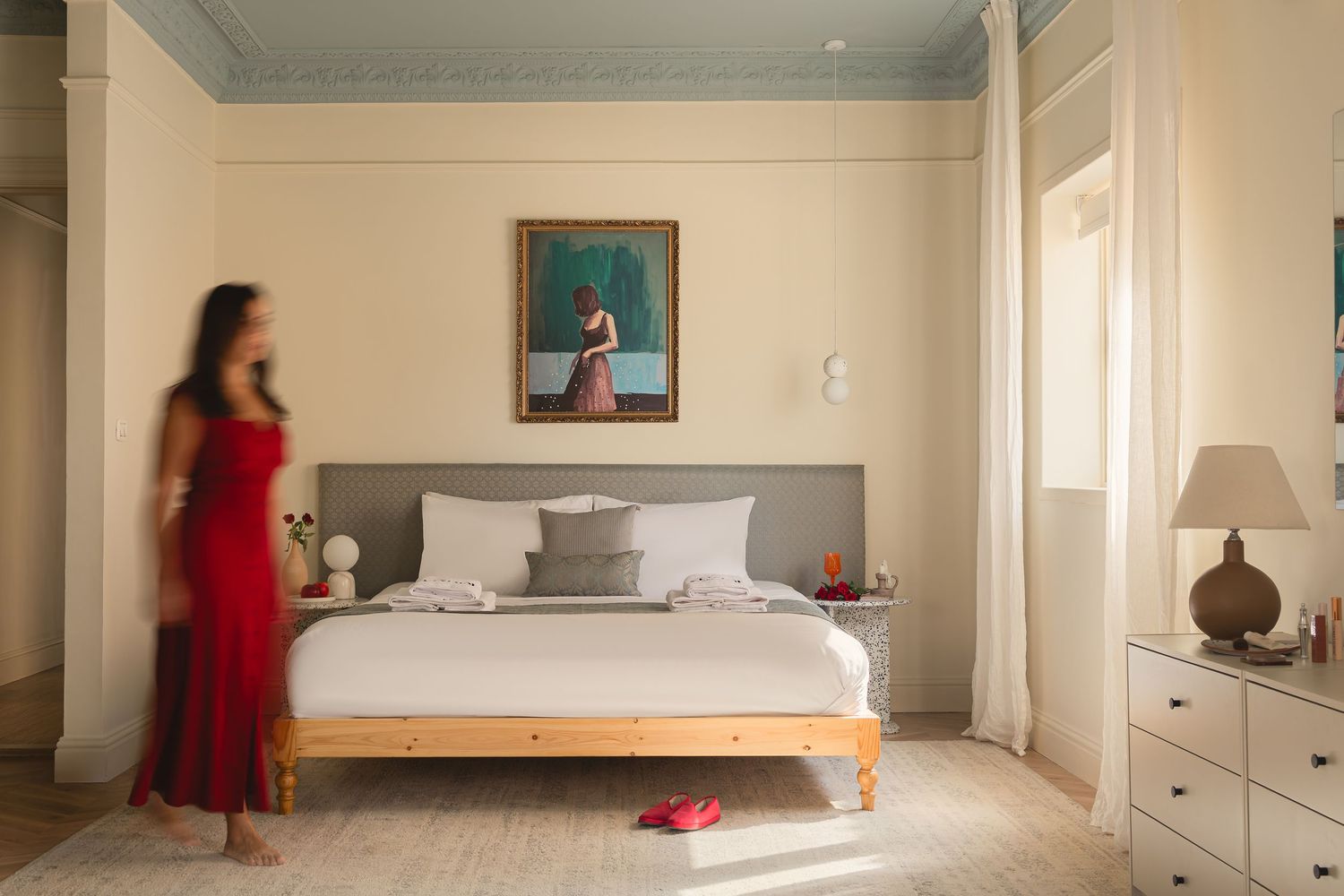 Minimalist bedroom interior with white walls and built-in storage. Interior Photography
