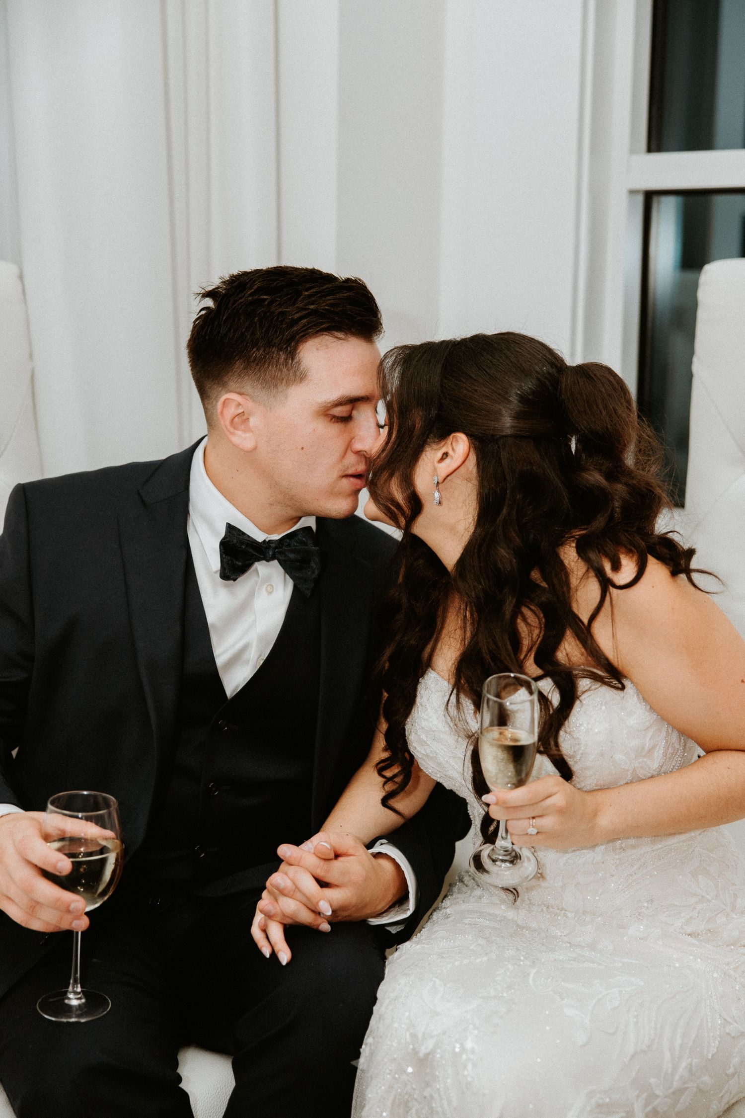 Portrait of Mr. & Mrs. Khoklan Kissing on their wedding day, Shot by Dylan Spangler