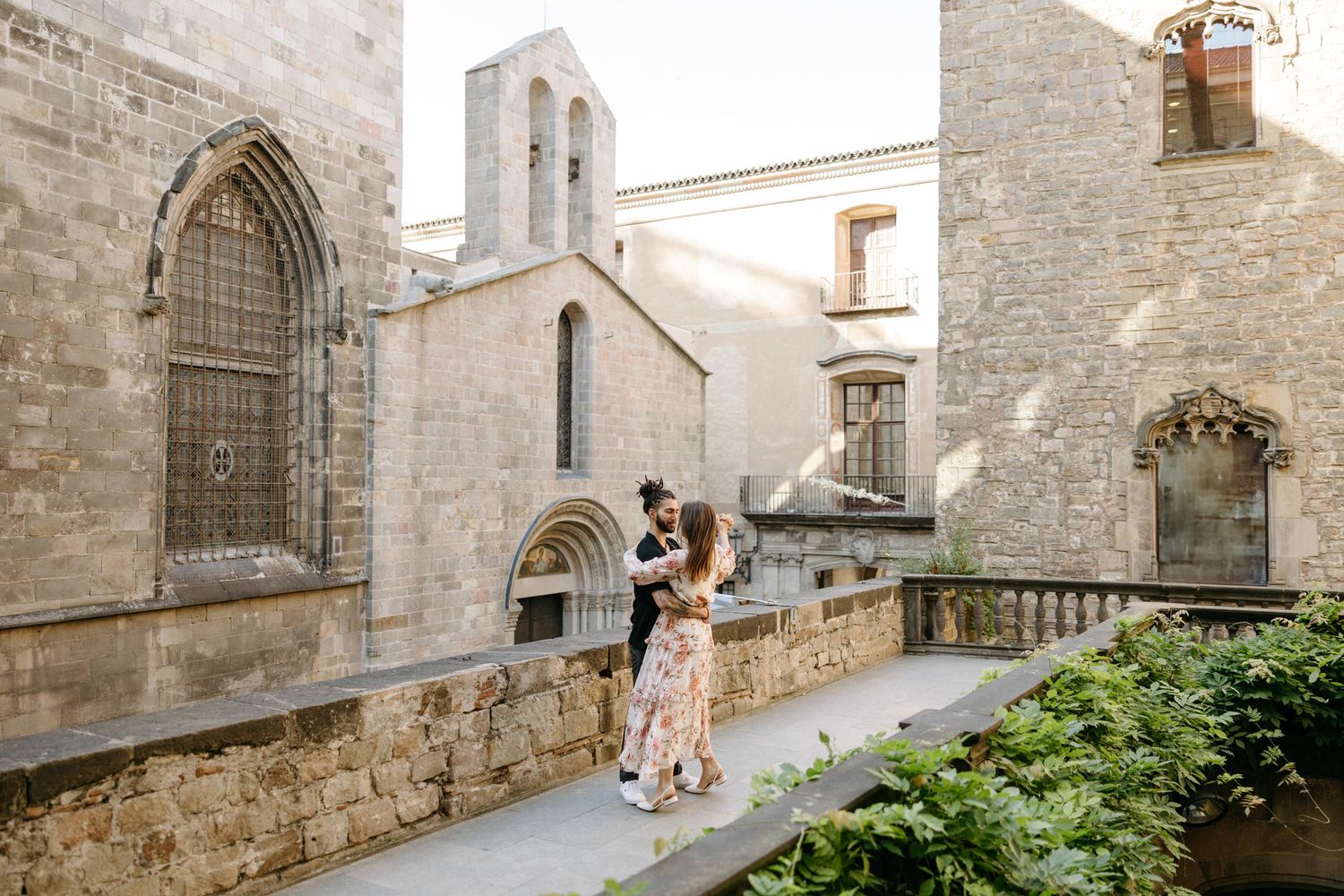 Ancient stone archways and medieval architecture in Barcelona's Gothic Quarter.