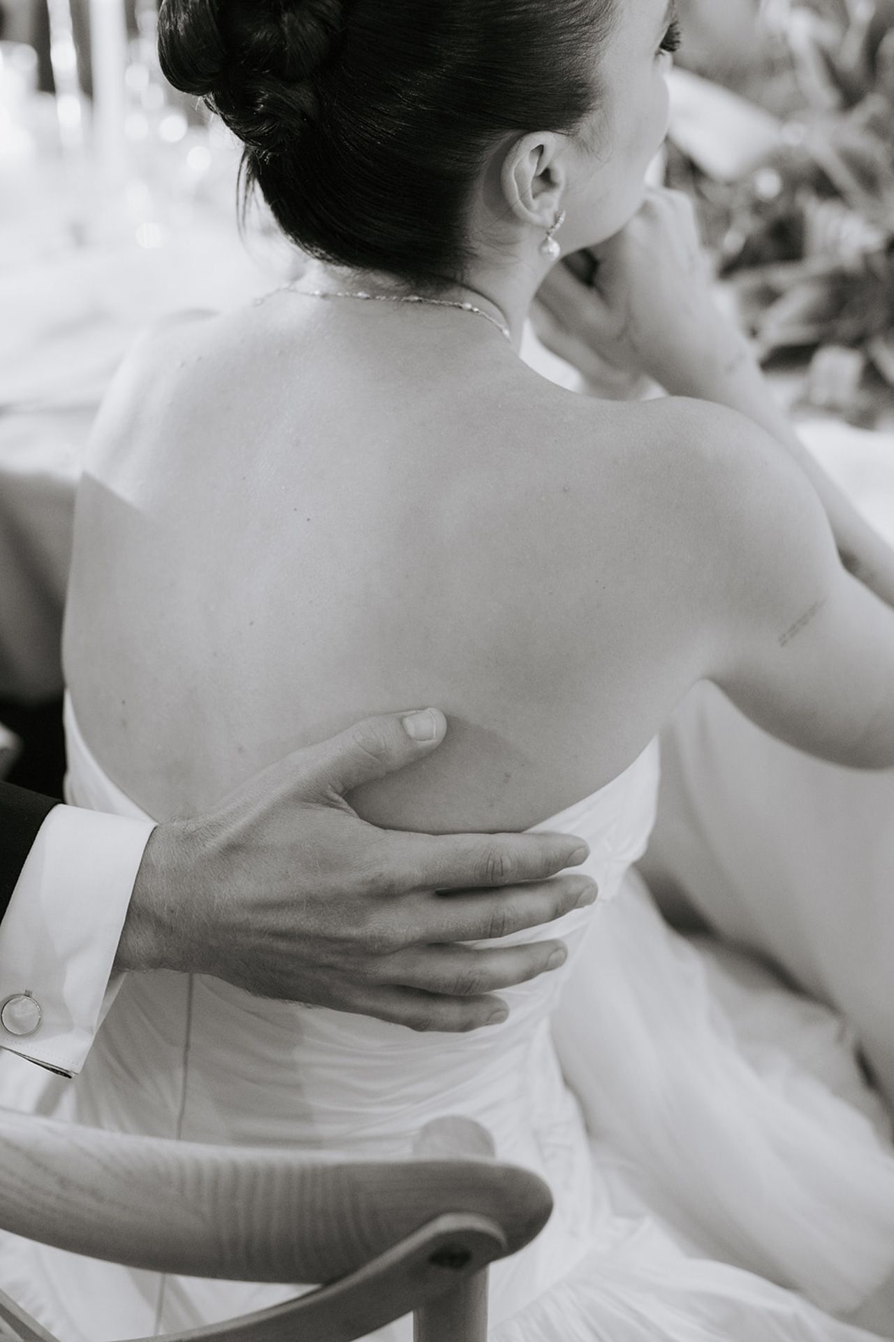 A black and white photo series showing someone's bare shoulder with medical adhesive patches applied.