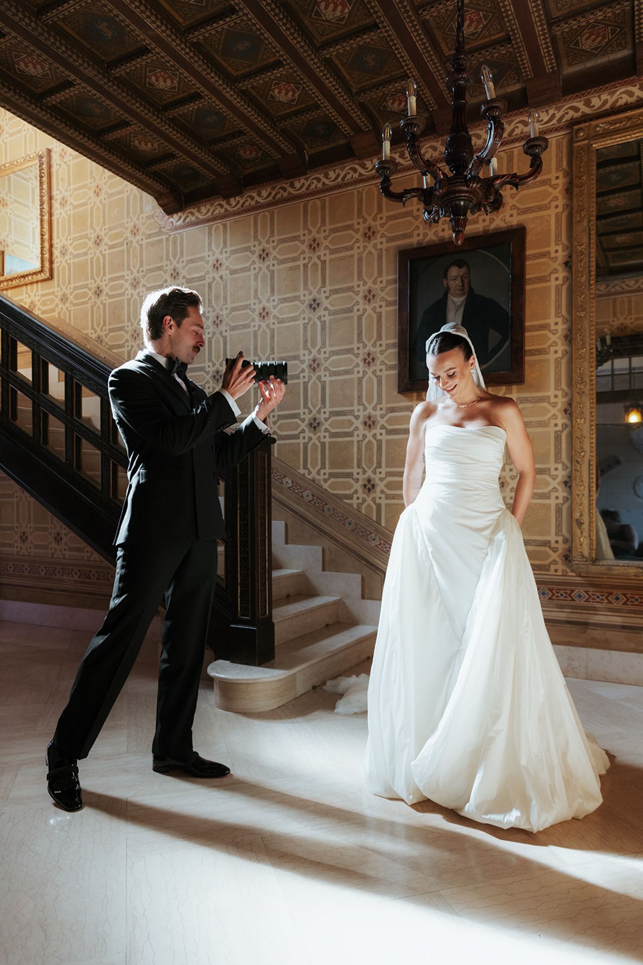 A series of wedding photos showing a bride and groom in a grand ballroom with ornate ceiling and marble staircase.