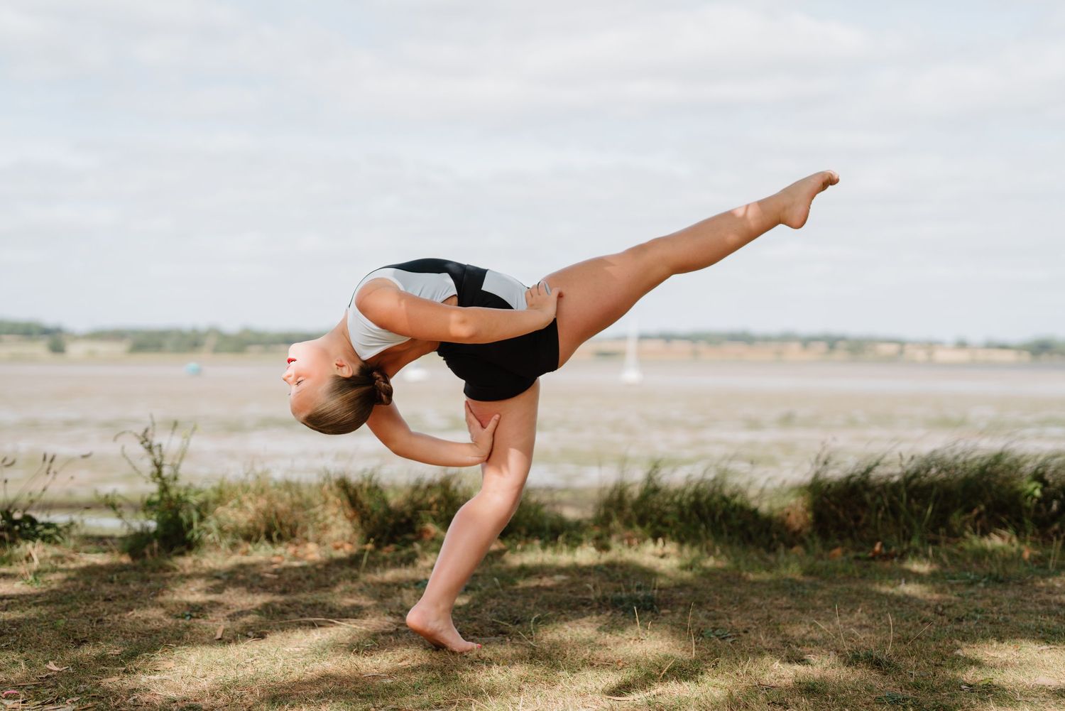 Artistic dance movements captured in a sequence against a bright outdoor backdrop. Manningtree, Essex.