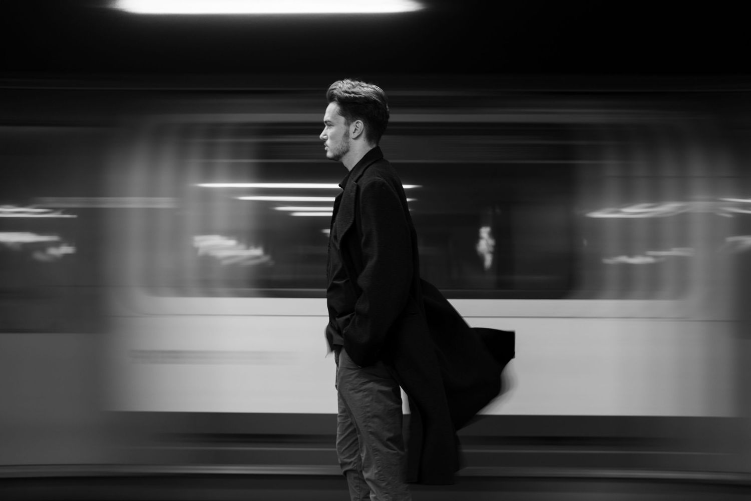 Abstract black and white motion blur sequence showing movement in a dark space. London, Uk.