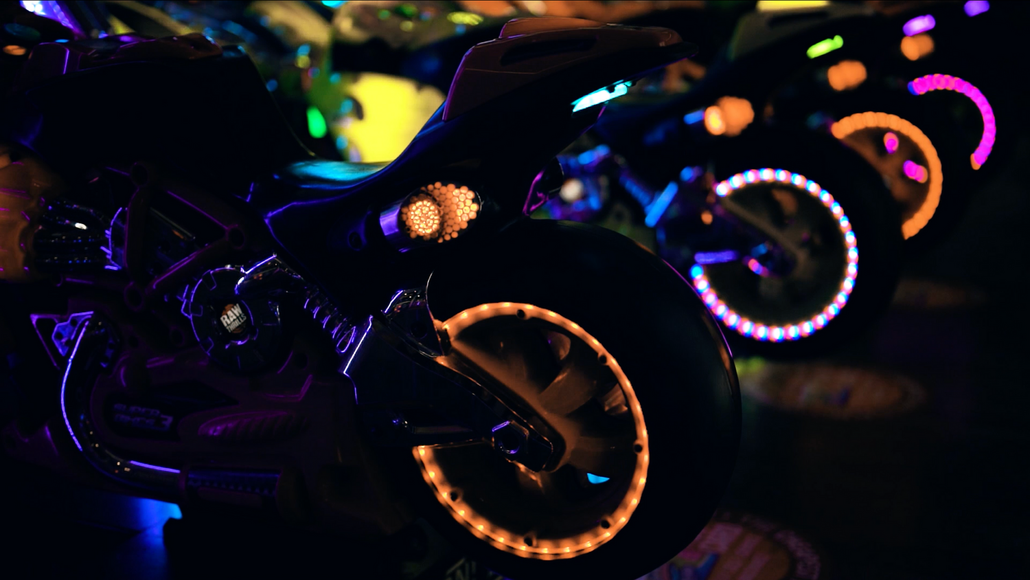 Colorful neon lights and party decorations creating a festive celebration atmosphere. Clacton Pier.