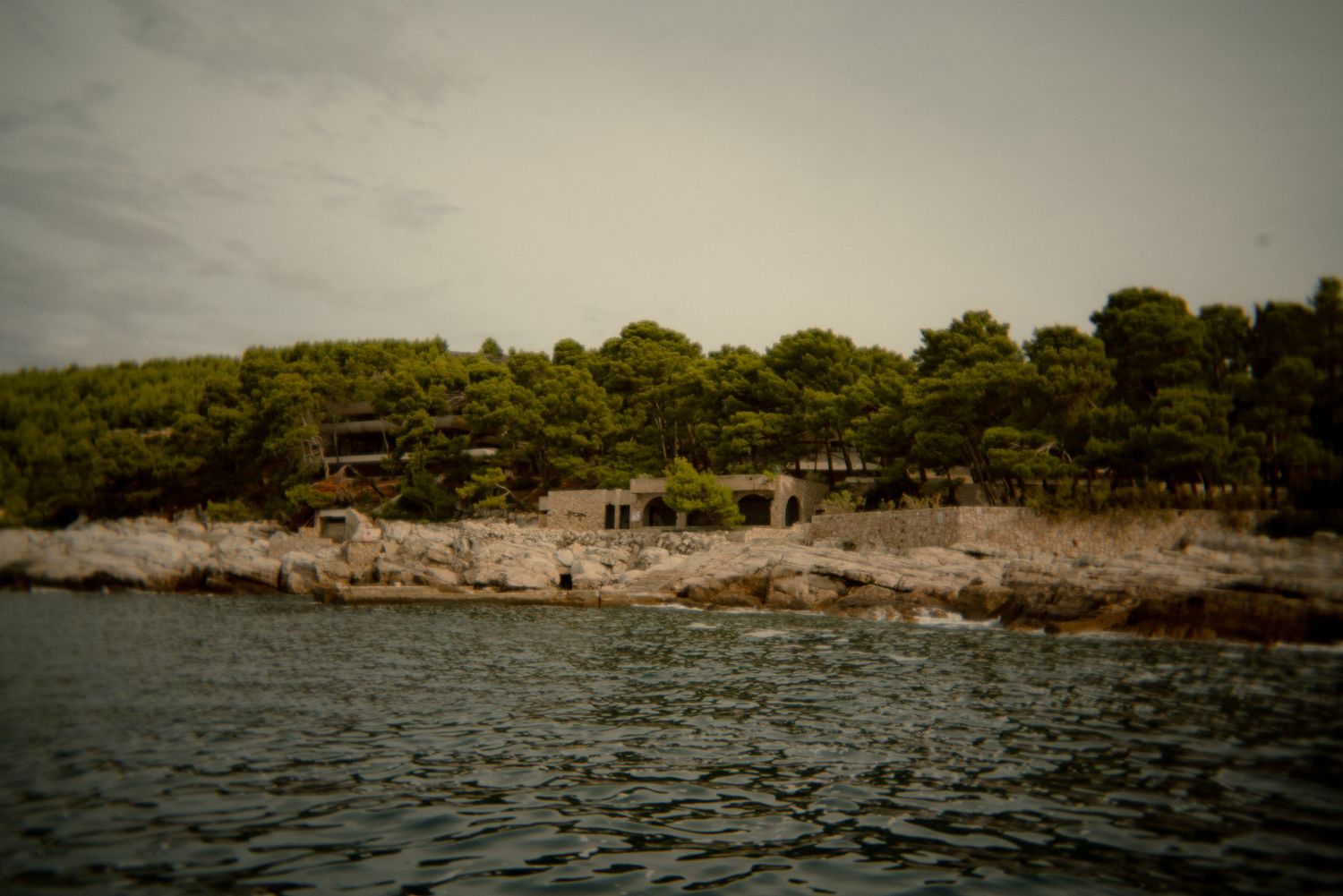 Panoramic coastal landscape with rocky shoreline and Mediterranean vegetation. Croatia.