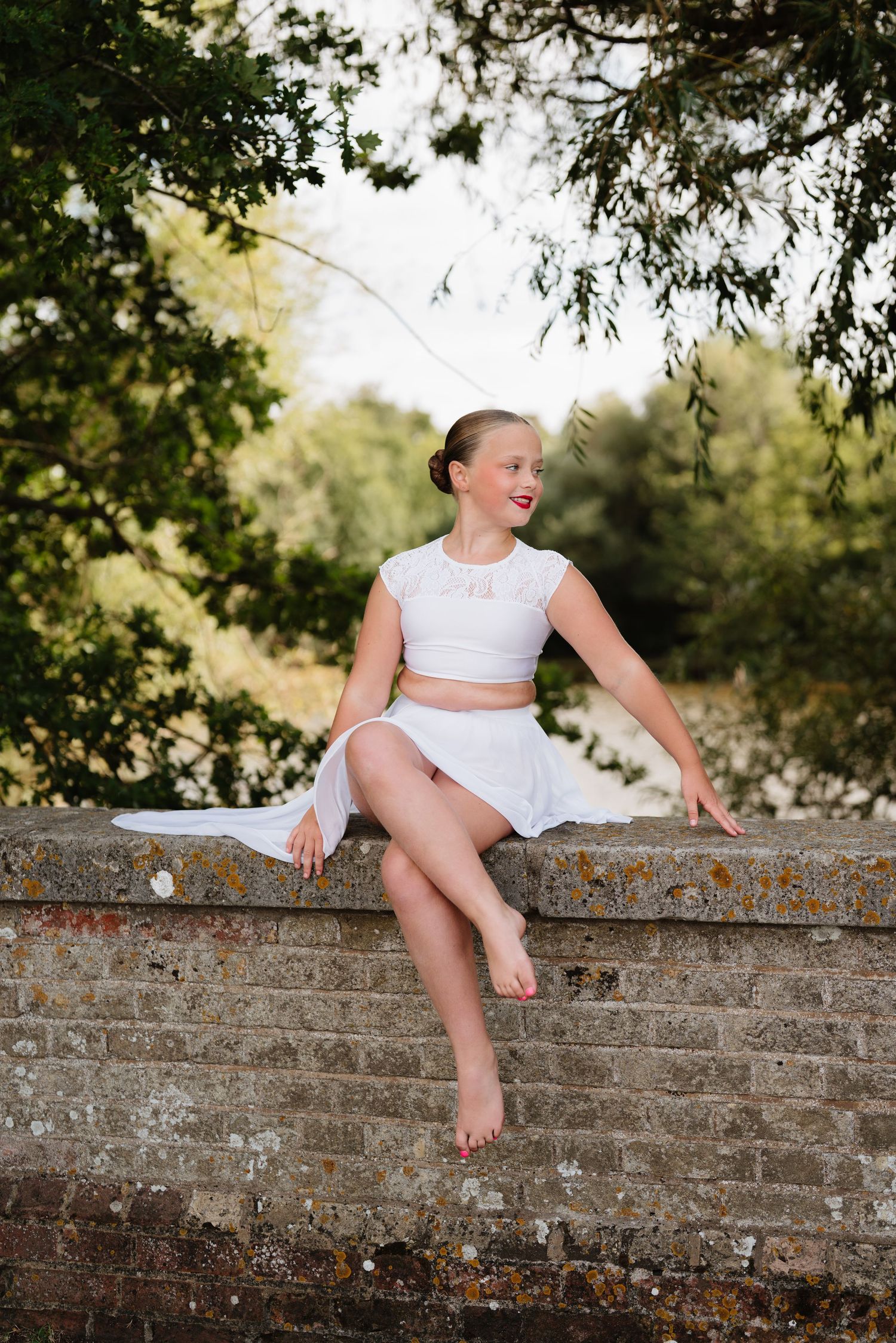A series of elegant movements displayed on an old brick wall in natural lighting. Manningtree, Essex.