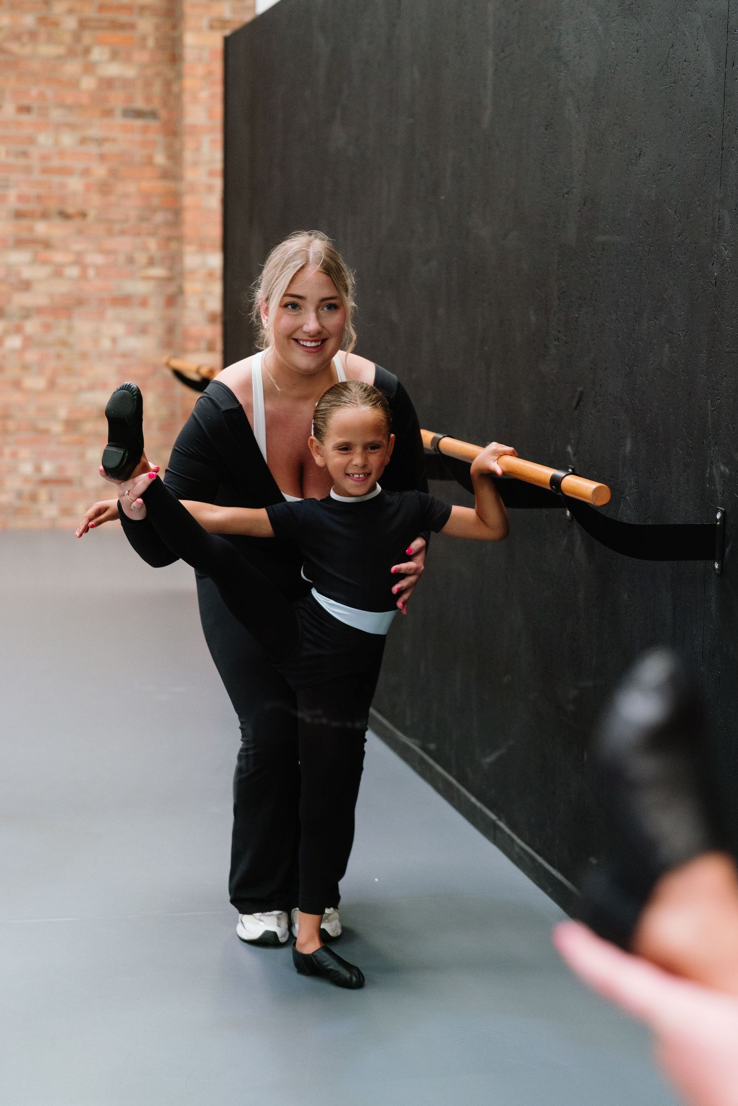 Dance instruction session showing balance and form techniques at a studio. Manningtree, Essex.