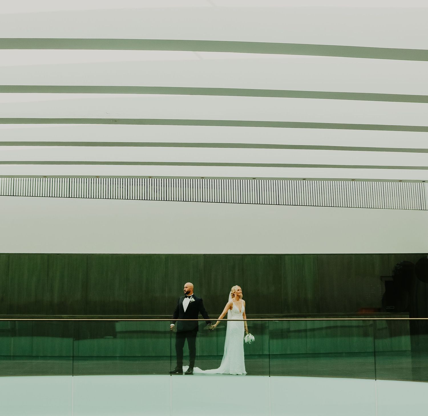Modern architectural wedding photo featuring minimalist lines and geometric patterns.
