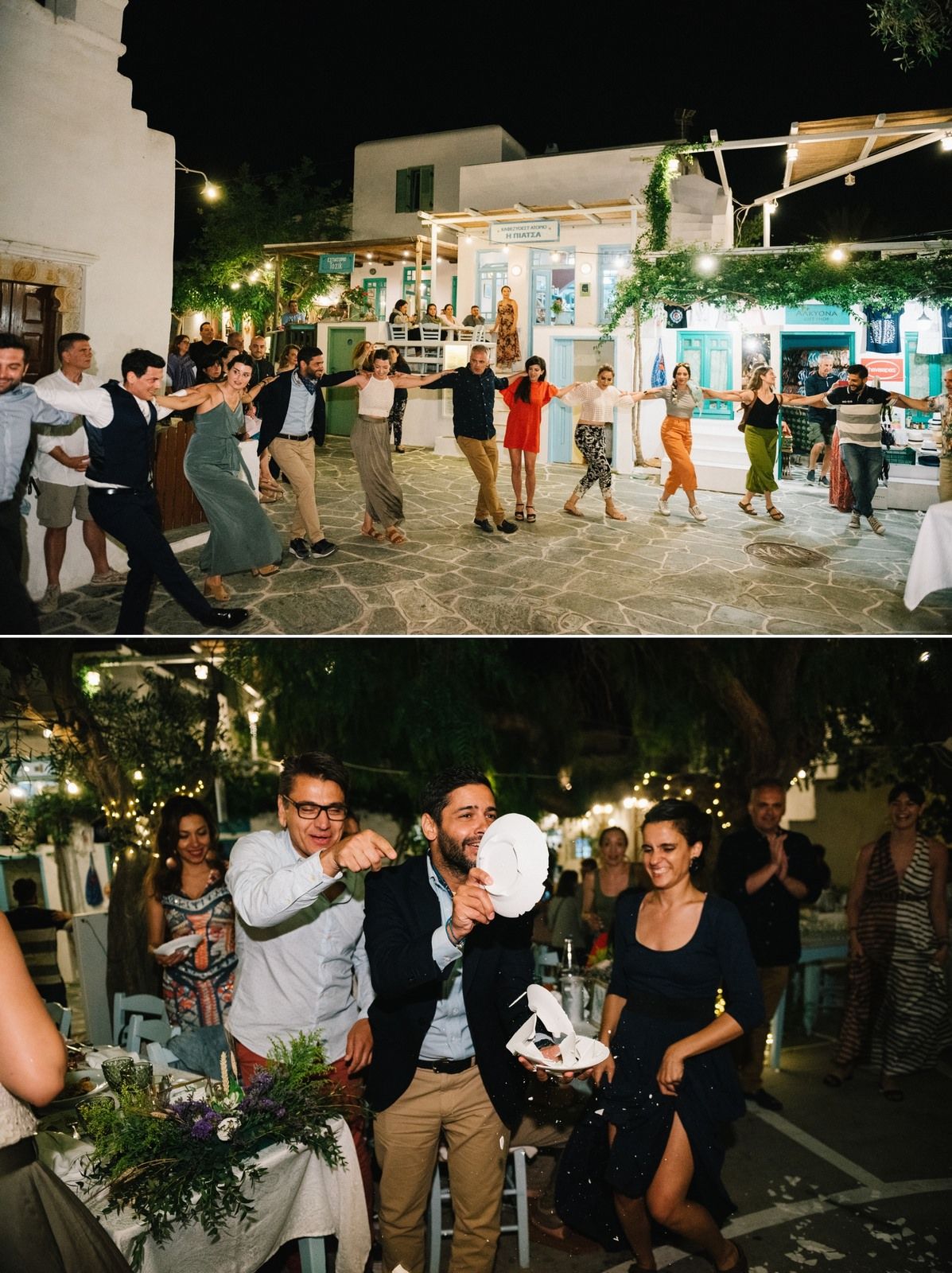 Nighttime wedding reception with guests dancing in a festively lit Mediterranean street.