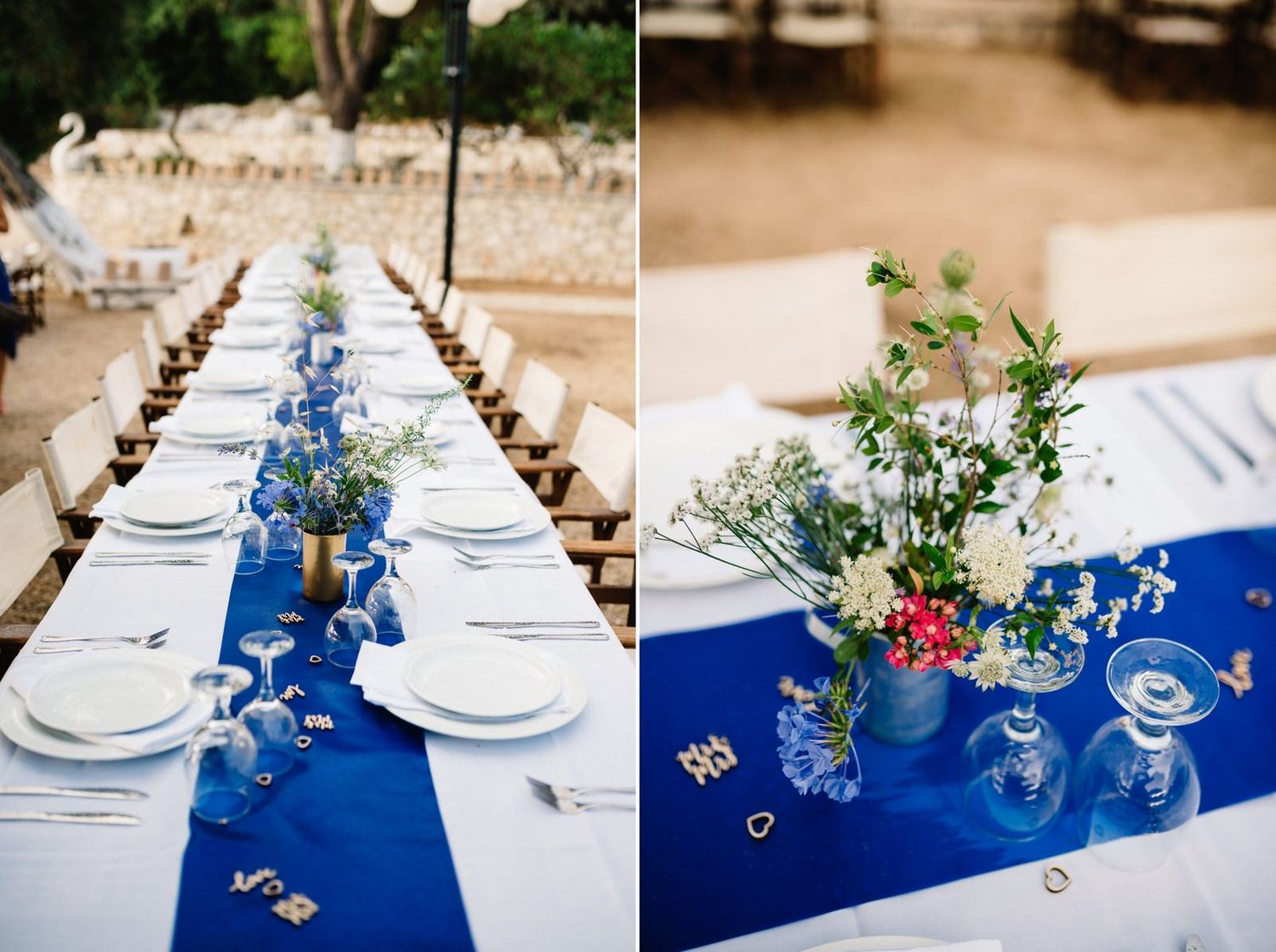 Long wedding reception tables with blue runners and white place settings decorated with wildflower centerpieces.