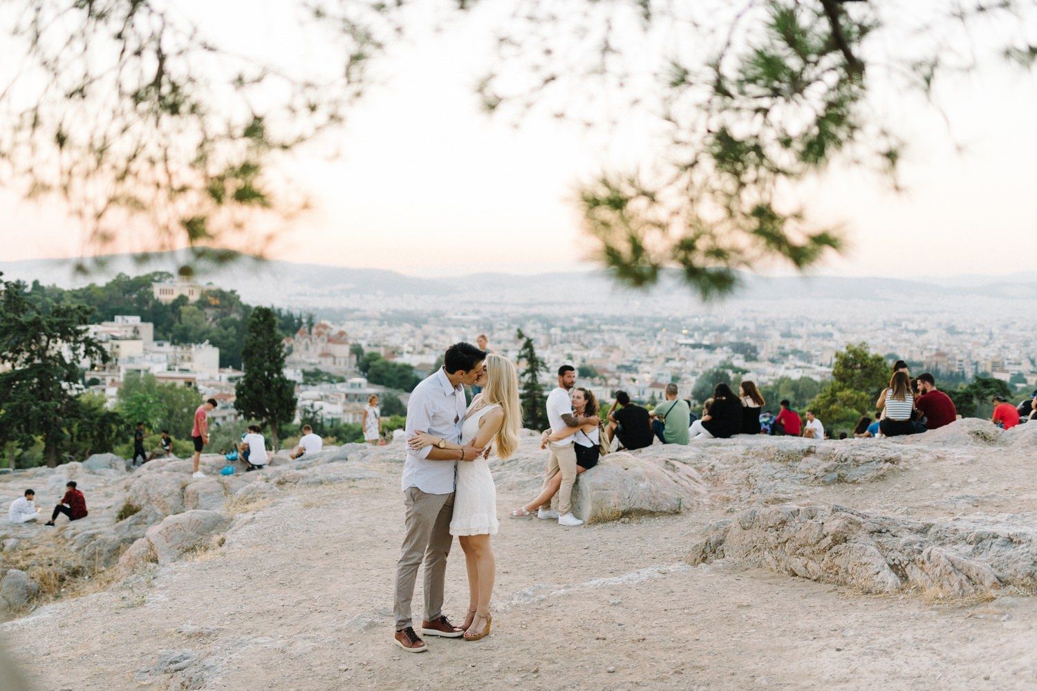 couple hug in filopappou hill athens