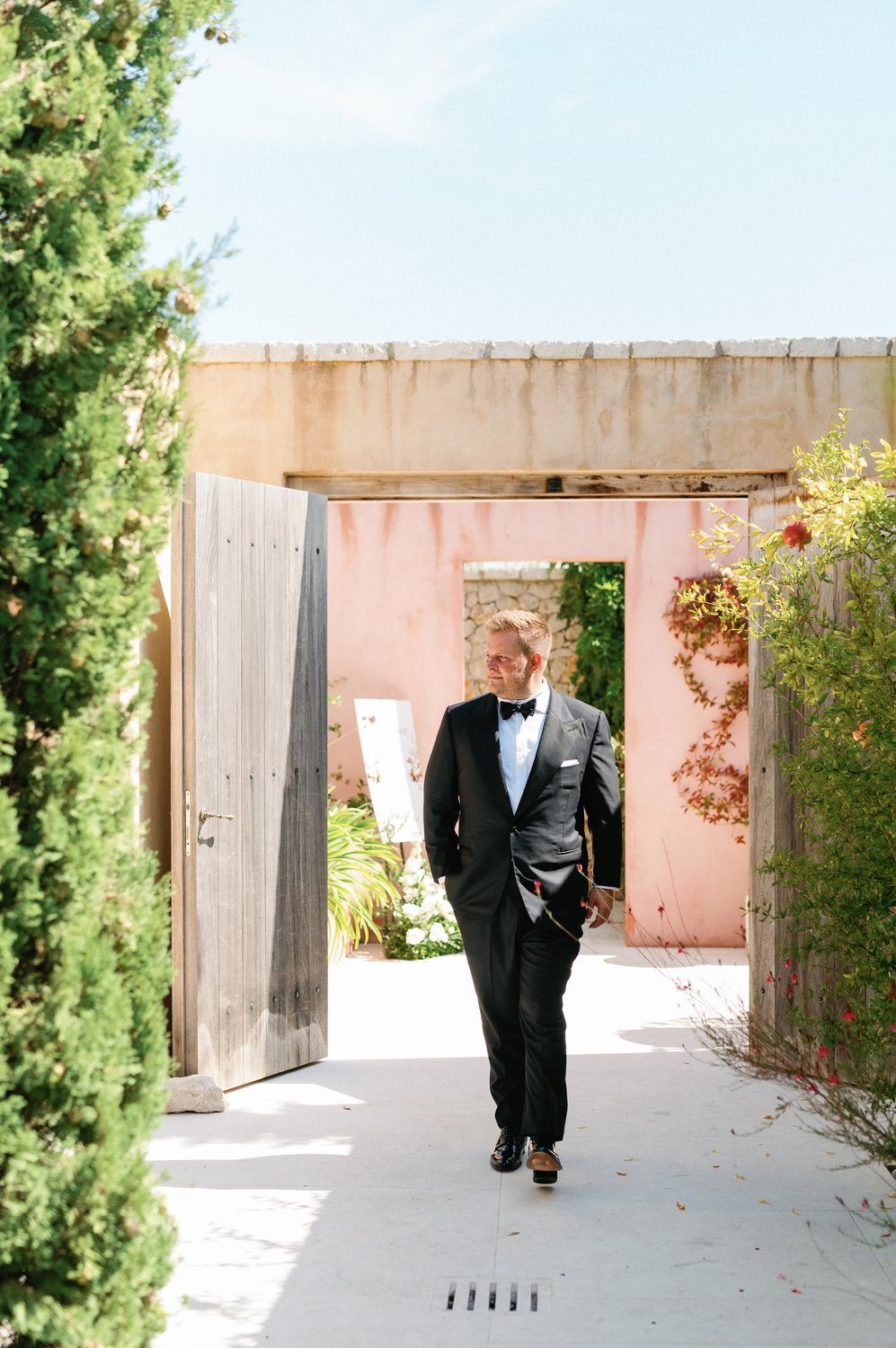 groom walking before his wedding
