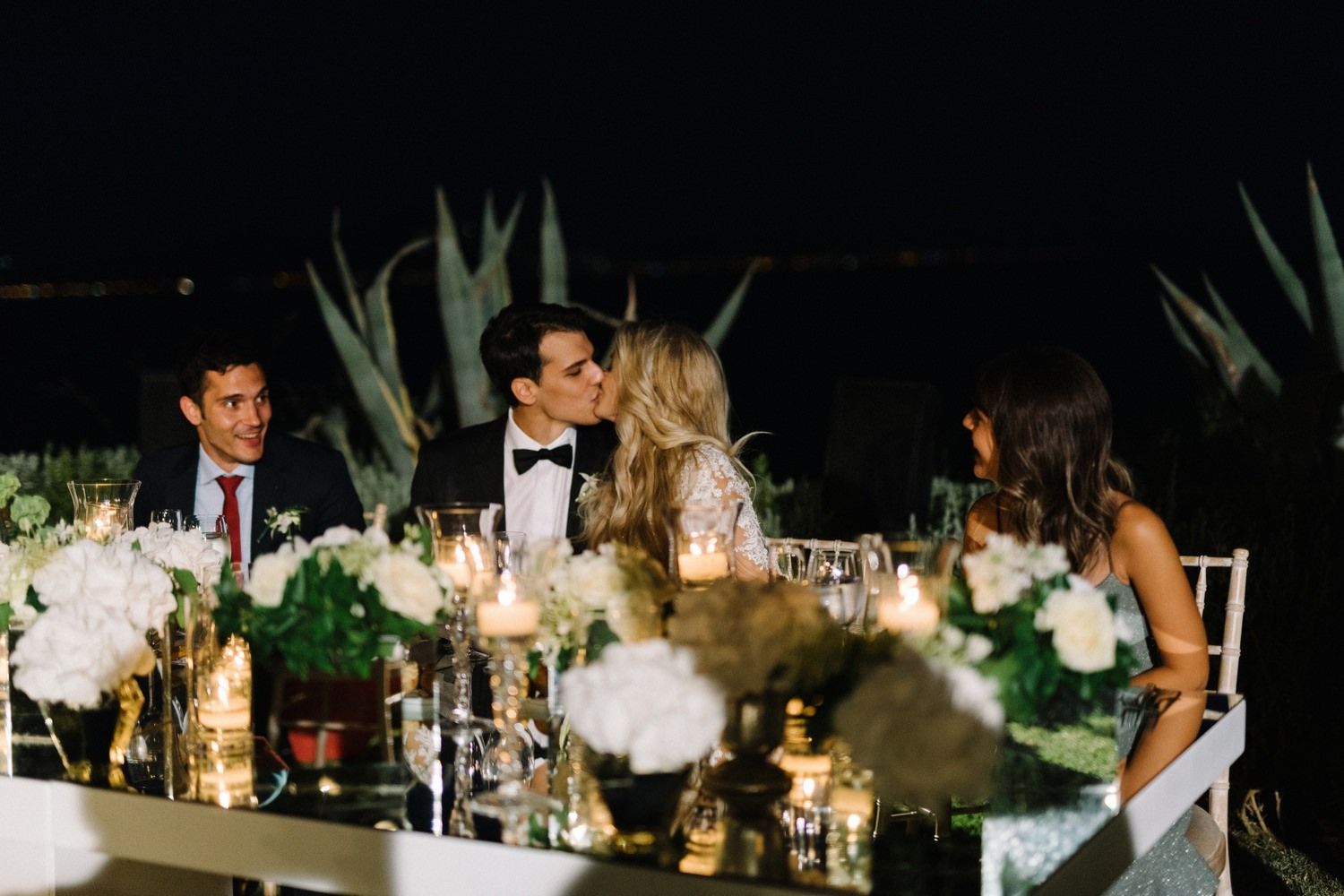 groom kissing the bride